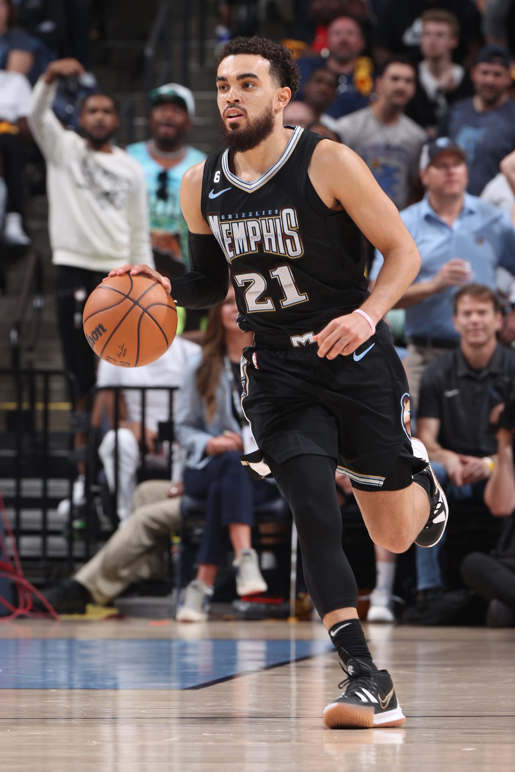 MEMPHIS, TN - APRIL 19: Tyus Jones #21 of the Memphis Grizzlies dribbles the ball during the game against the Los Angeles Lakers during Round One Game Two of the 2023 NBA Playoffs on April 19, 2023 at FedExForum in Memphis, Tennessee. NOTE TO USER: User expressly acknowledges and agrees that, by downloading and or using this photograph, User is consenting to the terms and conditions of the Getty Images License Agreement. Mandatory Copyright Notice: Copyright 2023 NBAE (Photo by Joe Murphy/NBAE via Getty Images)