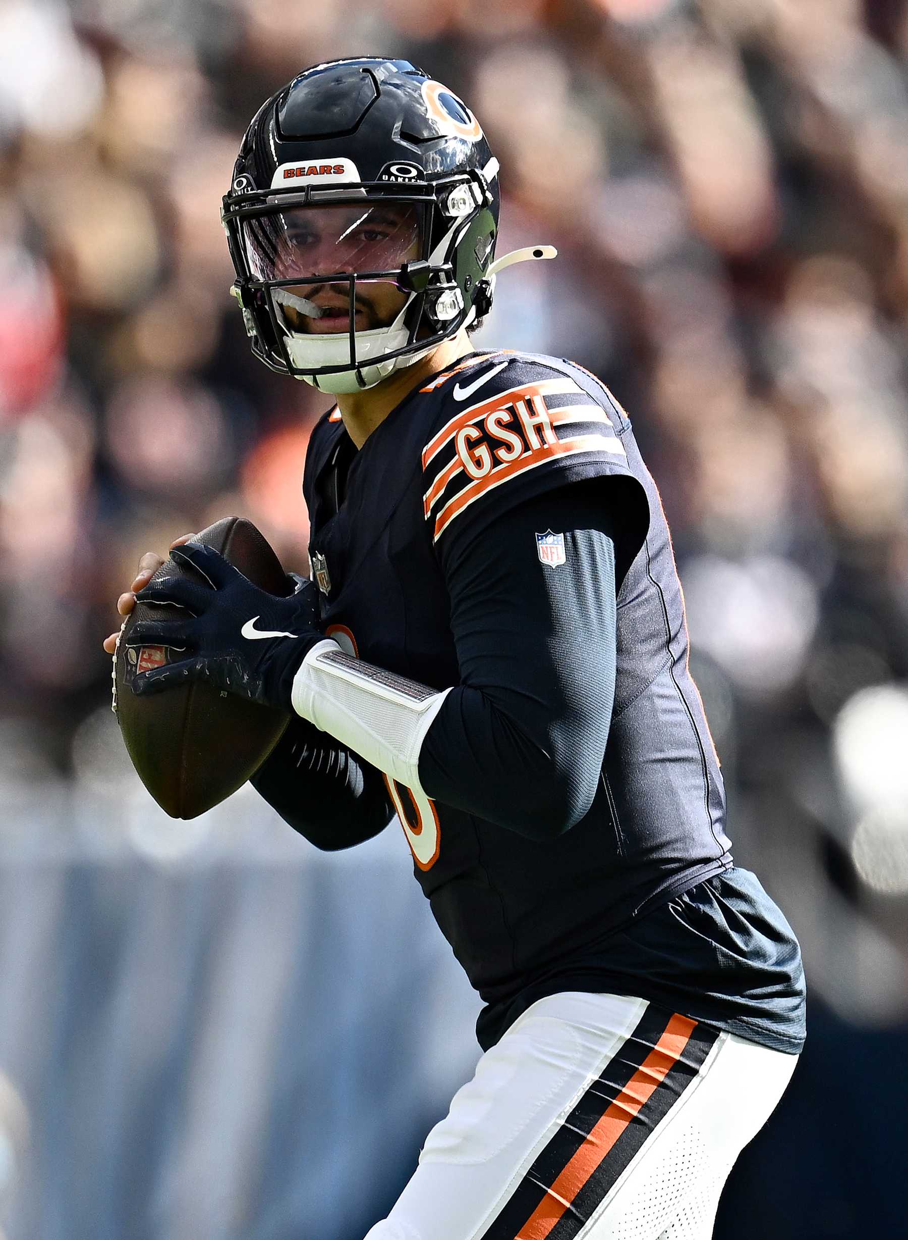 CHICAGO, ILLINOIS - NOVEMBER 10: Caleb Williams #18 of the Chicago Bears looks to pass the ball against the New England Patriots during the second quarter at Soldier Field on November 10, 2024 in Chicago, Illinois. (Photo by Quinn Harris/Getty Images)