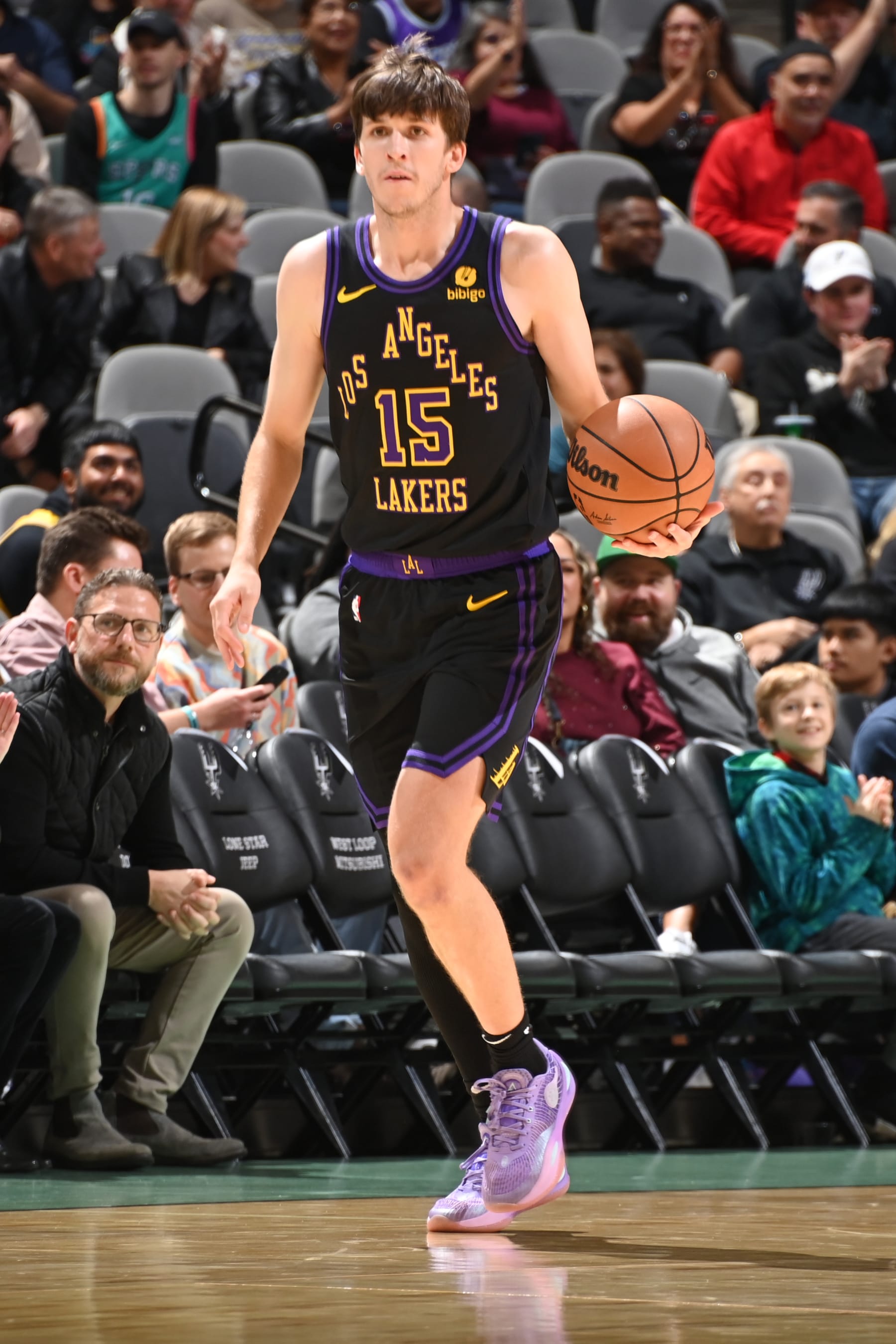 SAN ANTONIO, TX - DECEMBER 15:  Austin Reaves #15 of the Los Angeles Lakers handles the ball during the game  on December 15, 2023 at the Frost Bank Center in San Antonio, Texas. NOTE TO USER: User expressly acknowledges and agrees that, by downloading and or using this photograph, user is consenting to the terms and conditions of the Getty Images License Agreement. Mandatory Copyright Notice: Copyright 2023 NBAE (Photos by Andrew D. Bernstein/NBAE via Getty Images)