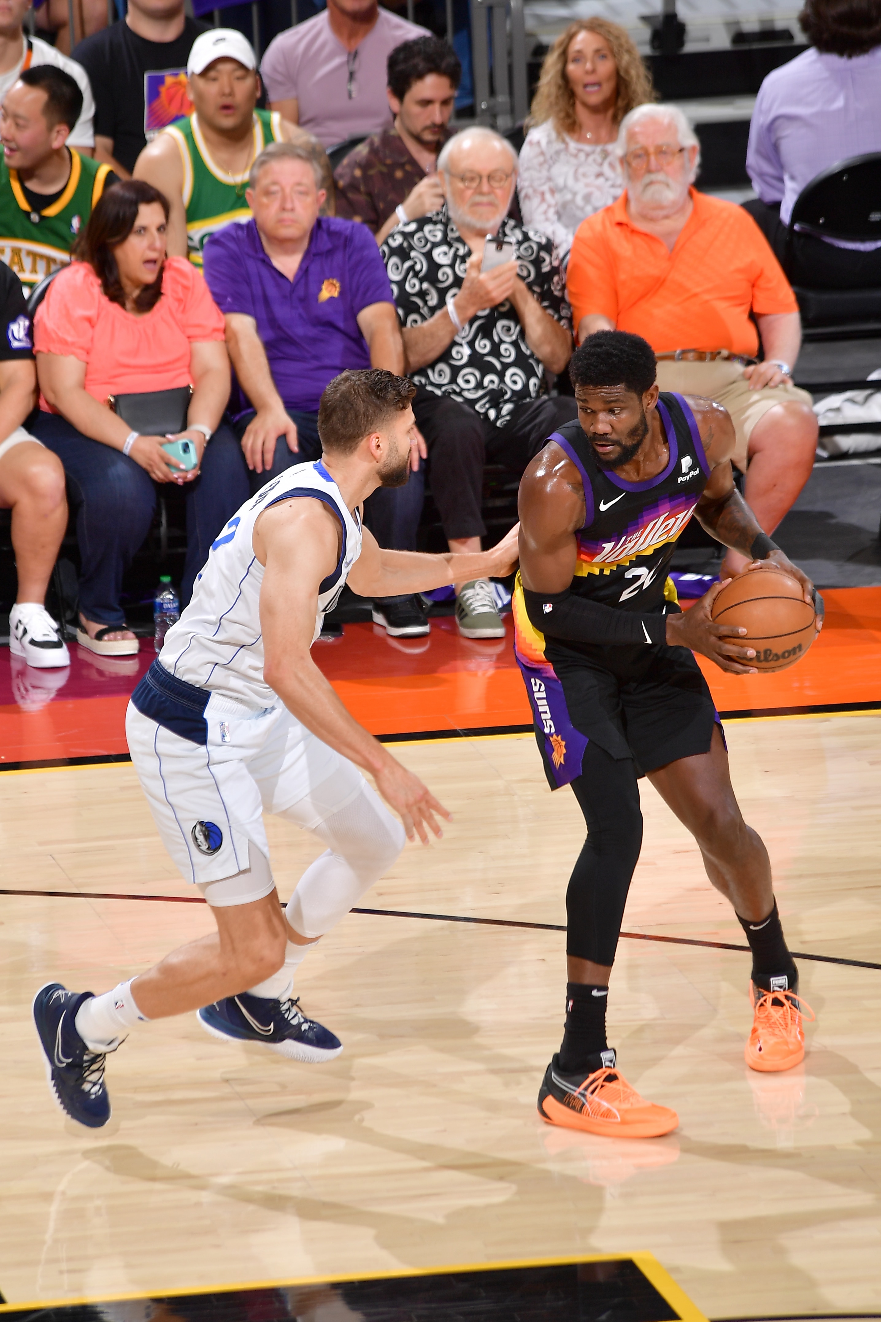 PHOENIX, AZ - MAY 15: Deandre Ayton #22 of the Phoenix Suns dribbles the ball during the game against the Dallas Mavericks during Game 7 of the 2022 NBA Playoffs Western Conference Semifinals on May 15, 2022 at Footprint Center in Phoenix, Arizona. NOTE TO USER: User expressly acknowledges and agrees that, by downloading and or using this photograph, user is consenting to the terms and conditions of the Getty Images License Agreement. Mandatory Copyright Notice: Copyright 2022 NBAE (Photo by Michael Gonzales/NBAE via Getty Images)
