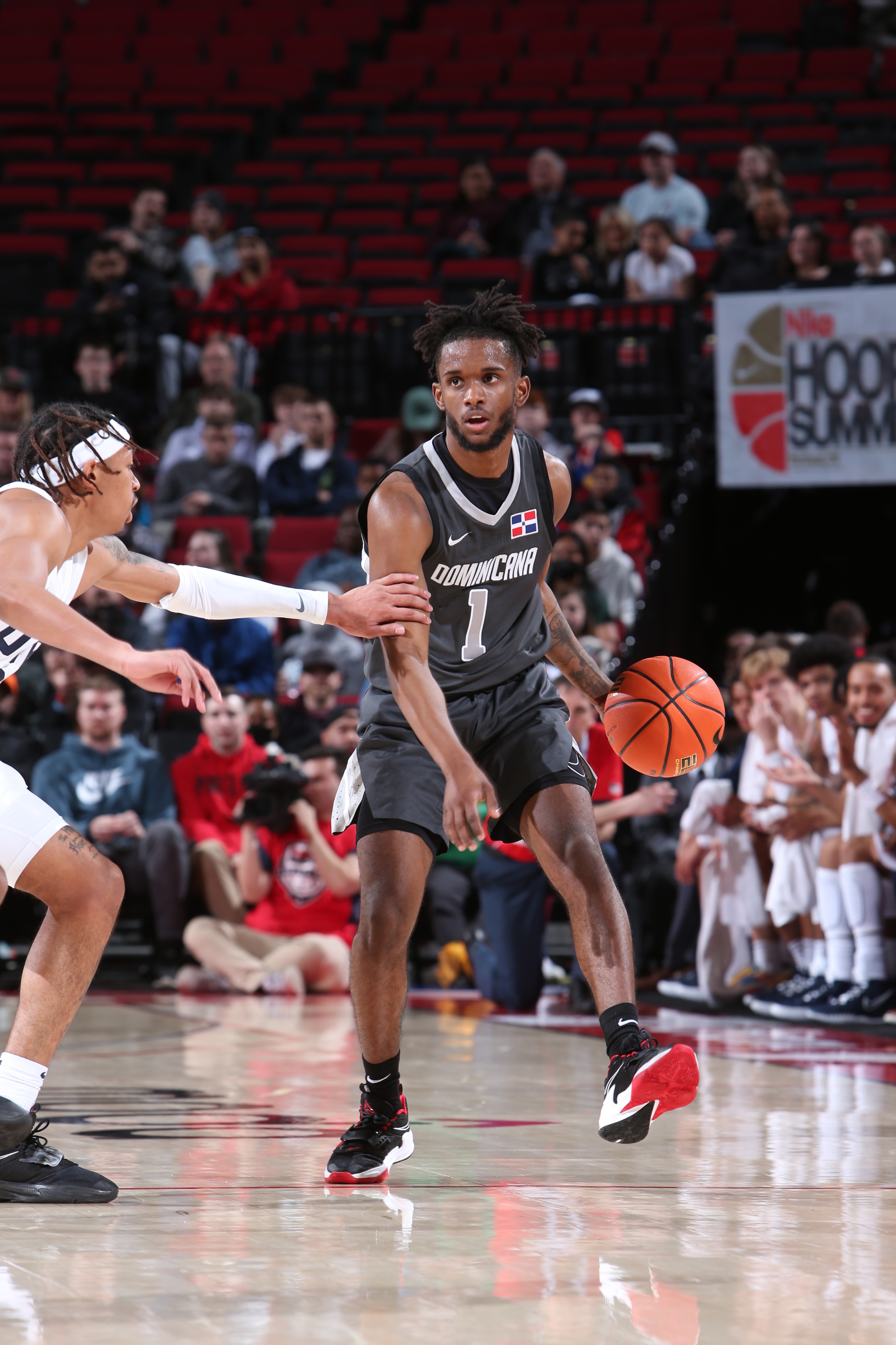 PORTLAND, OR - APRIL 8: Jean Montero #1 of Team World dribbles against Team USA during the 2022 Nike Hoop Summit on April 8, 2022 at the Moda Center Arena in Portland, Oregon. NOTE TO USER: User expressly acknowledges and agrees that, by downloading and or using this photograph, user is consenting to the terms and conditions of the Getty Images License Agreement. Mandatory Copyright Notice: Copyright 2022 NBAE (Photo by Sam Forencich/NBAE via Getty Images)