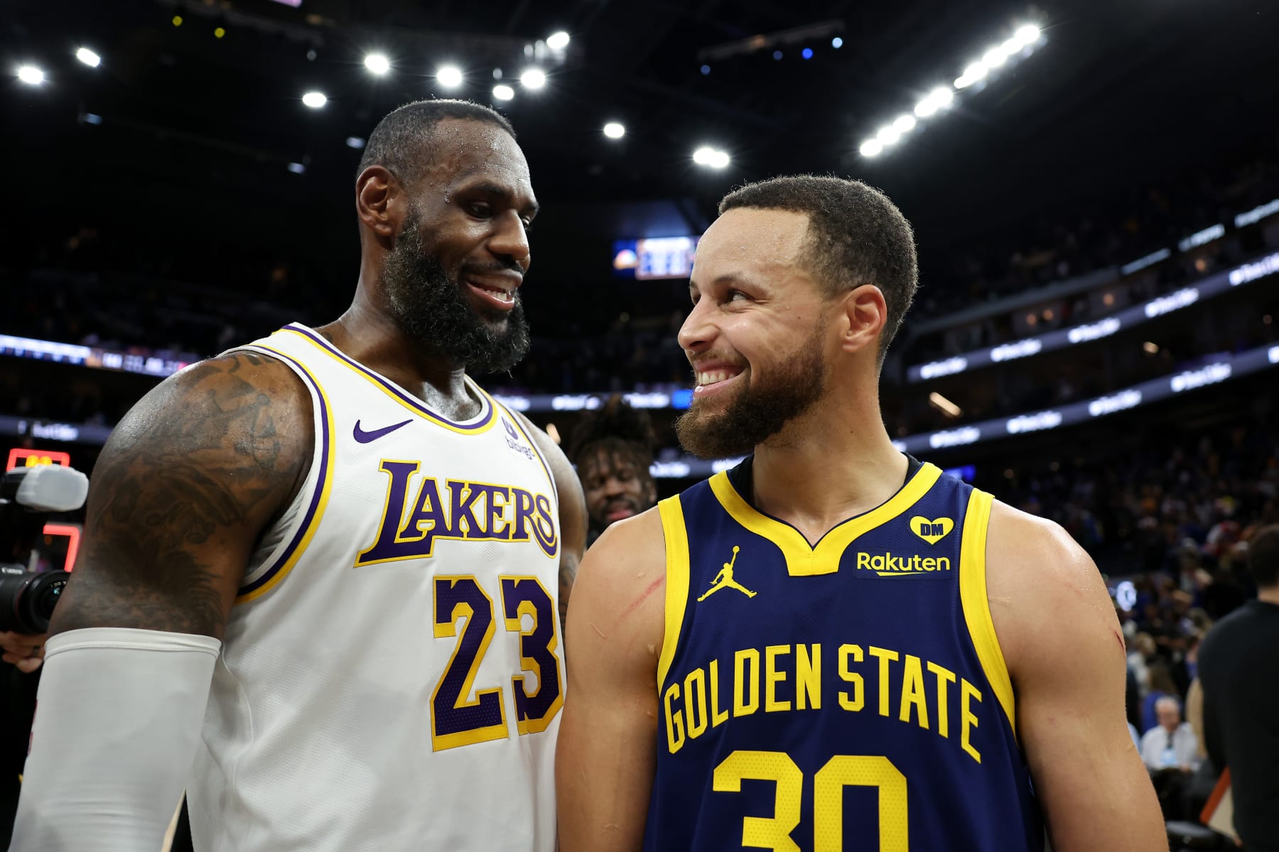 SAN FRANCISCO, CALIFORNIA - JANUARY 27: LeBron James #23 of the Los Angeles Lakers and Stephen Curry #30 of the Golden State Warriors talk to each other after the Lakers beat the Warriors in double overtime at Chase Center on January 27, 2024 in San Francisco, California. NOTE TO USER: User expressly acknowledges and agrees that, by downloading and or using this photograph, User is consenting to the terms and conditions of the Getty Images License Agreement.  (Photo by Ezra Shaw/Getty Images)