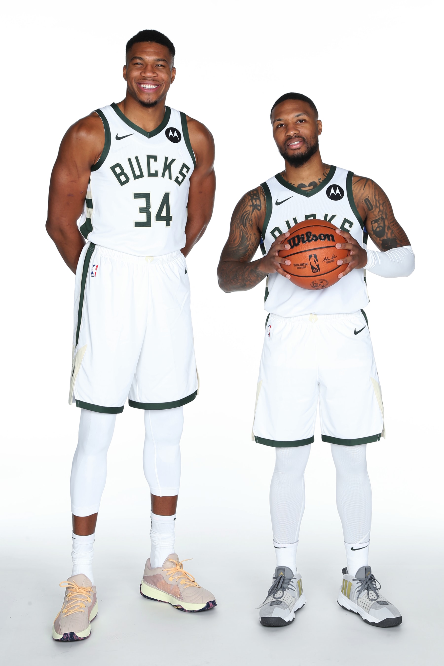 MILWAUKEE, WI - OCTOBER 02: Giannis Antetokounmpo #34 and Damian Lillard #0 of the Milwaukee Bucks pose for a portrait during 2023-24 NBA Media Day on October 02, 2023 at the Froedtert & Medical Science of Wisconsin Sports Science Center in Milwaukee, Wisconsin. NOTE TO USER: User expressly acknowledges and agrees that, by downloading and or using this Photograph, user is consenting to the terms and conditions of the Getty Images License Agreement. Mandatory Copyright Notice: Copyright 2023 NBAE (Photo by Gary Dineen/NBAE via Getty Images)