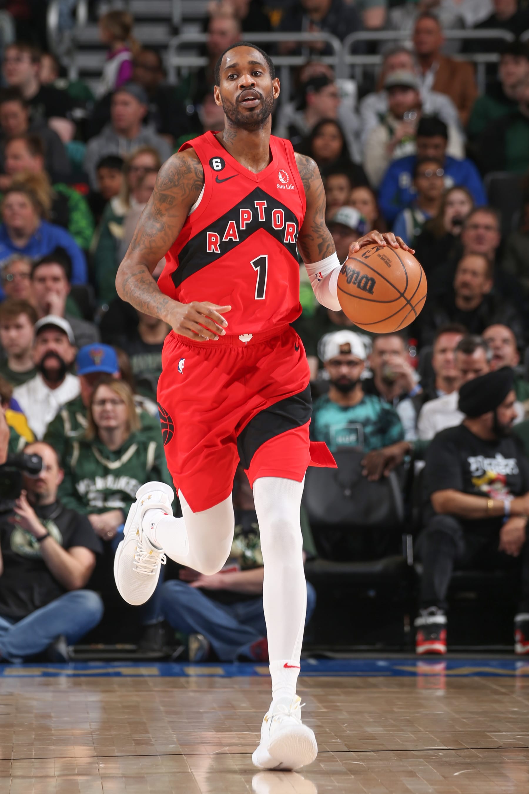 MILWAUKEE, WI - MARCH 19:  Will Barton #1 of the Toronto Raptors handles the ball during the game  on March 19, 2023 at the Fiserv Forum Center in Milwaukee, Wisconsin. NOTE TO USER: User expressly acknowledges and agrees that, by downloading and or using this Photograph, user is consenting to the terms and conditions of the Getty Images License Agreement. Mandatory Copyright Notice: Copyright 2023 NBAE (Photo by Gary Dineen/NBAE via Getty Images).
