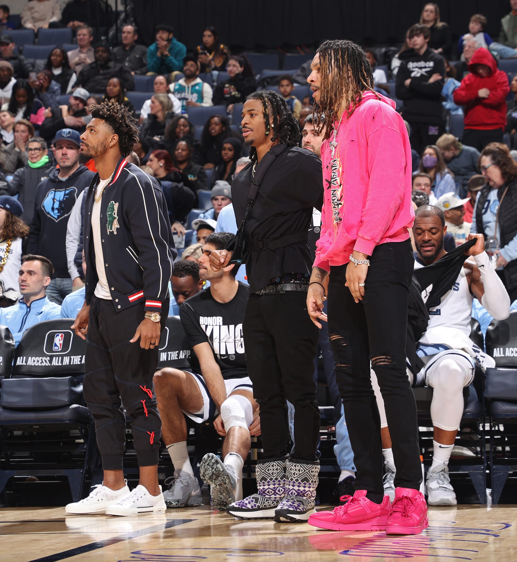 MEMPHIS, TN - JANUARY 15: Marcus Smart #36, Ja Morant #12, and Brandon Clarke #15 of the Memphis Grizzlies look on during the game against the Golden State Warriors on January 15, 2024 at FedExForum in Memphis, Tennessee. NOTE TO USER: User expressly acknowledges and agrees that, by downloading and or using this photograph, User is consenting to the terms and conditions of the Getty Images License Agreement. Mandatory Copyright Notice: Copyright 2024 NBAE (Photo by Joe Murphy/NBAE via Getty Images)
