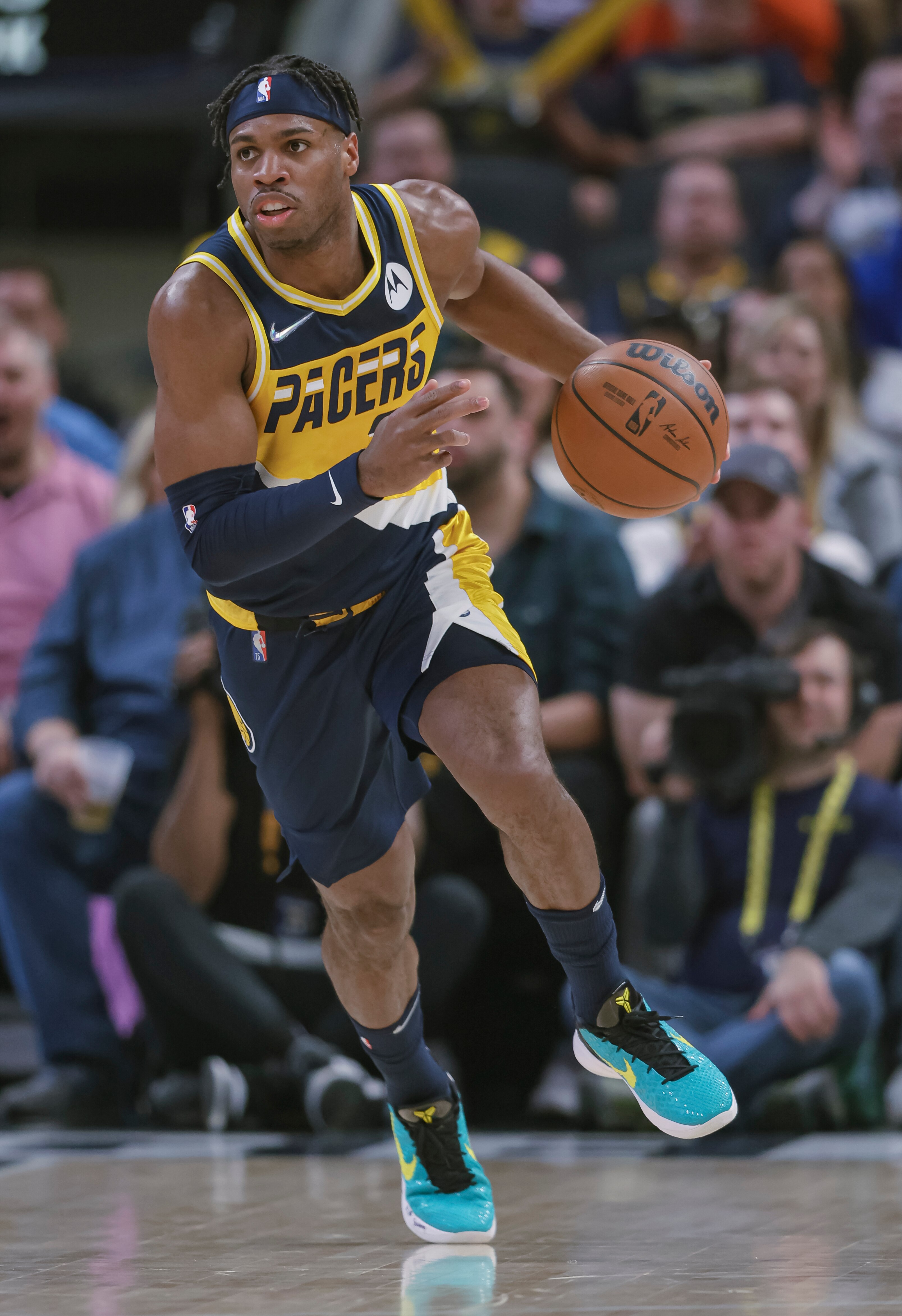 INDIANAPOLIS, IN - APRIL 03: Buddy Hield #24 of the Indiana Pacers brings the ball up court during the game against the Detroit Pistons at Gainbridge Fieldhouse on April 3, 2022 in Indianapolis, Indiana. NOTE TO USER: User expressly acknowledges and agrees that, by downloading and or using this photograph, User is consenting to the terms and conditions of the Getty Images License Agreement. (Photo by Michael Hickey/Getty Images)