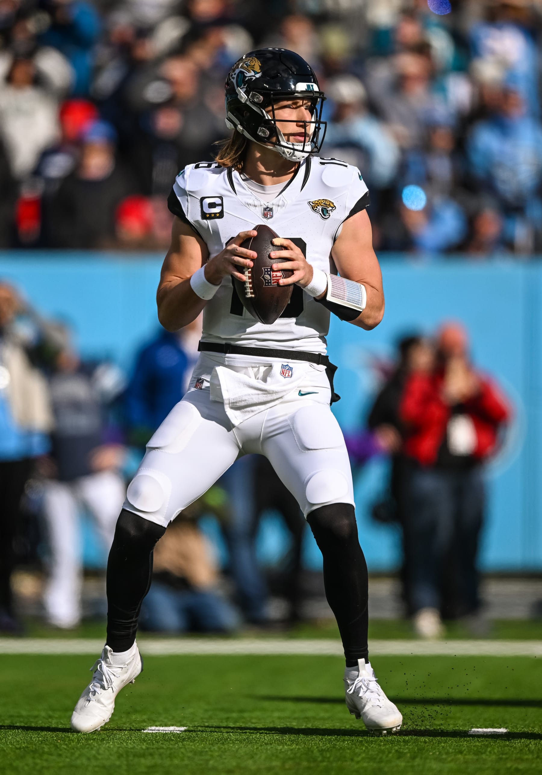 NASHVILLE, TN - JANUARY 07: Jacksonville Jaguars quarterback Trevor Lawrence (16) sets up to pass during the NFL game between the Tennessee Titans and the Jacksonville Jaguars on January 7, 2024, at Nissan Stadium in Nashville, TN. (Photo by Bryan Lynn/Icon Sportswire via Getty Images)