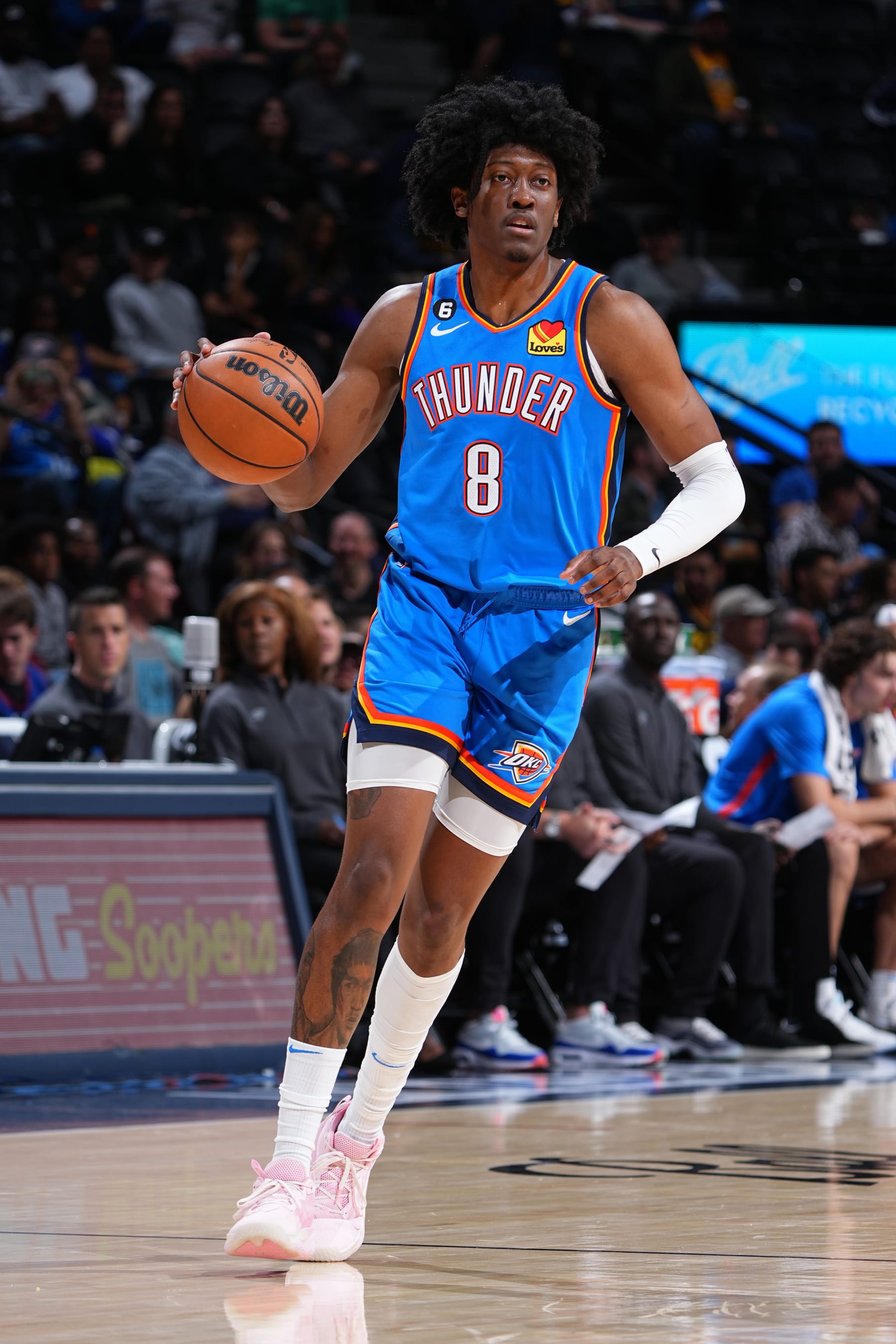 DENVER, CO - OCTOBER 3: Jalen Williams #8 of the Oklahoma City Thunder dribbles the ball during the game against the Denver Nuggets on October 3, 2022 at the Ball Arena in Denver, Colorado. NOTE TO USER: User expressly acknowledges and agrees that, by downloading and/or using this Photograph, user is consenting to the terms and conditions of the Getty Images License Agreement. Mandatory Copyright Notice: Copyright 2022 NBAE (Photo by Garrett Ellwood/NBAE via Getty Images)