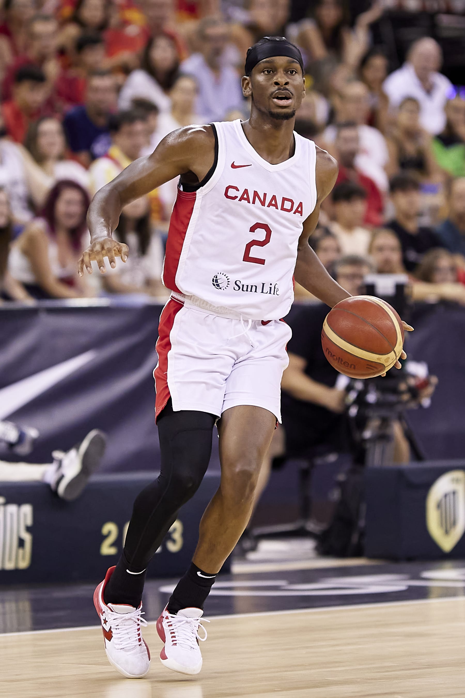 GRANADA, SPAIN - AUGUST 17: Shai Gilgeous-Alexander of the Canada Men's National Basketball Team runs with the ball during the Ciudad de Granada Trophy match between Spain and Canada at Palacio Municipal de Deportes de Granada on August 17, 2023 in Granada, Spain. (Photo by Fermin Rodriguez/Quality Sport Images/Getty Images)