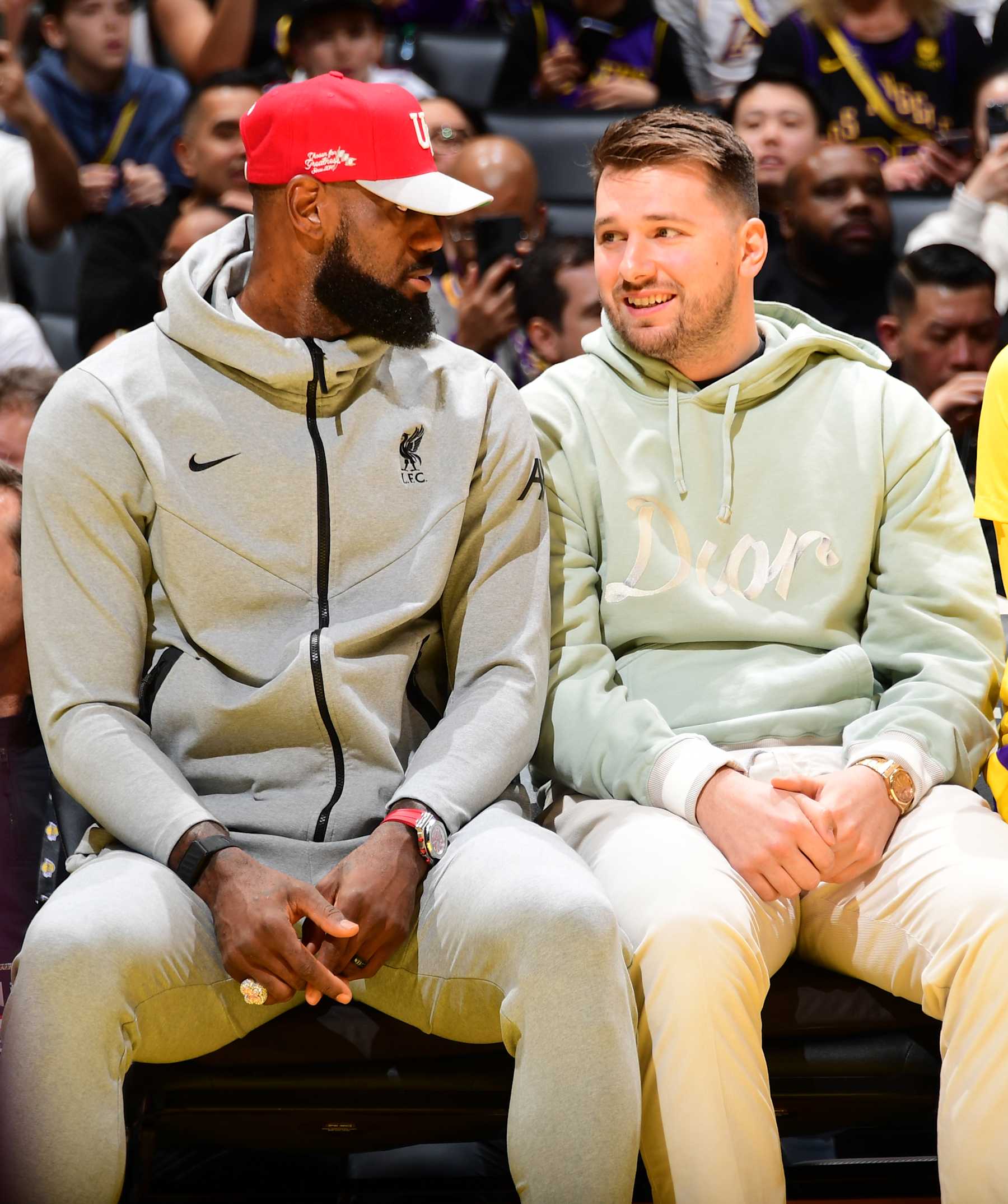 LOS ANGELES, CA - FEBRUARY 8: LeBron James #23 and Luka Doncic #77 of the Los Angeles Lakers looks on during the game against the Indiana Pacers on February 8, 2025 at Crypto.Com Arena in Los Angeles, California. NOTE TO USER: User expressly acknowledges and agrees that, by downloading and/or using this Photograph, user is consenting to the terms and conditions of the Getty Images License Agreement. Mandatory Copyright Notice: Copyright 2025 NBAE (Photo by Adam Pantozzi/NBAE via Getty Images)