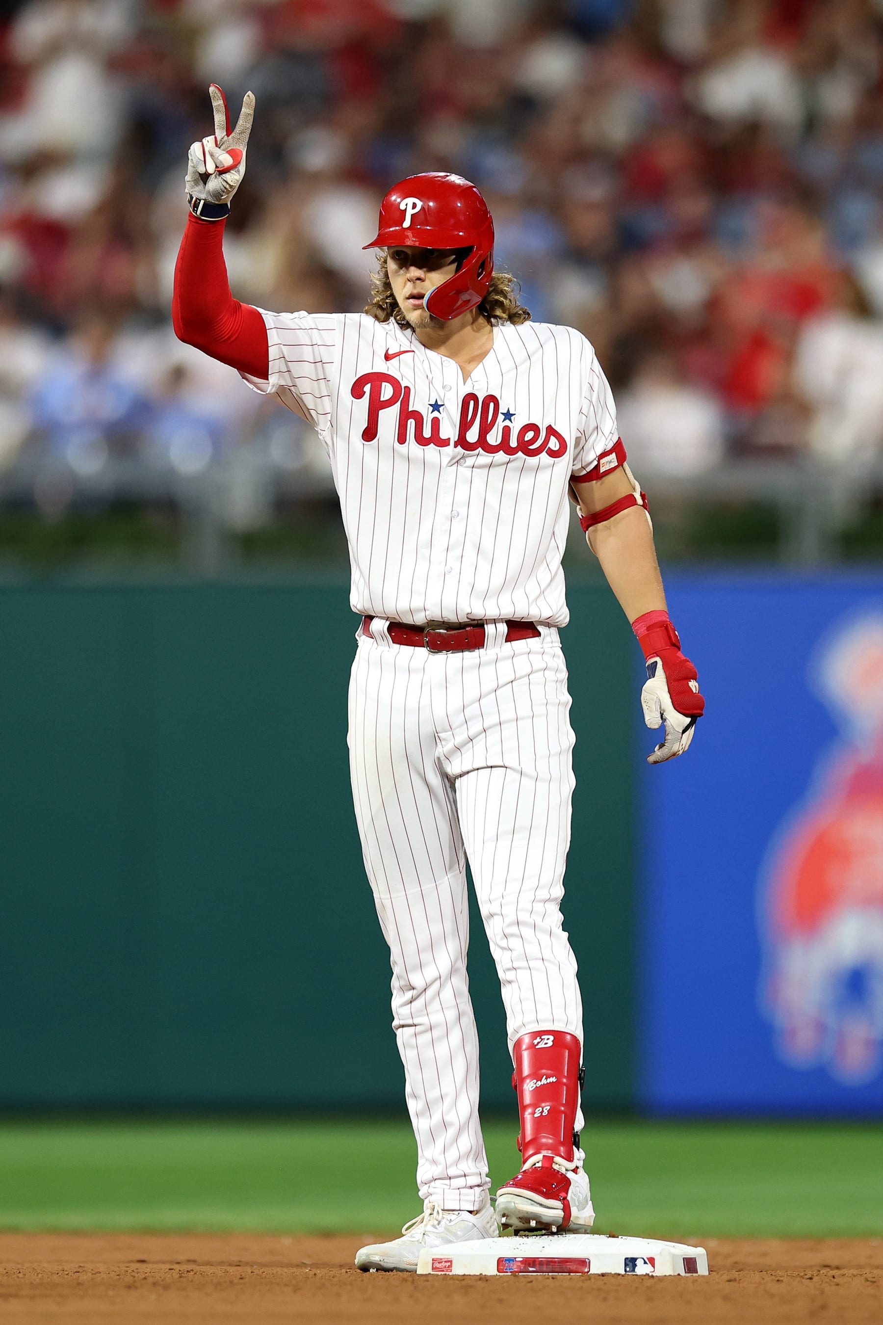PHILADELPHIA, PENNSYLVANIA - AUGUST 29: Alec Bohm #28 of the Philadelphia Phillies reacts after hitting a double during the seventh inning against the Los Angeles Angels at Citizens Bank Park on August 29, 2023 in Philadelphia, Pennsylvania. (Photo by Tim Nwachukwu/Getty Images)