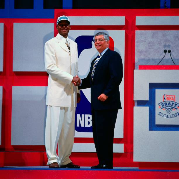 EAST RUTHERFORD, NJ - JUNE 26:  Ray Allen shakes hands with NBA Commissioner David Stern after being selected fifth overall by the Minnesota Timberwolves during the 1996 NBA Draft on June 26, 1996 at the Brendan Byrne Arena in East Rutherford, New Jersey. NOTE TO USER: User expressly acknowledges and agrees that, by downloading and or using this photograph, User is consenting to the terms and conditions of the Getty Images License Agreement. Mandatory Copyright Notice: Copyright 1996 NBAE (Photo by Nathaniel S. Butler/NBAE via Getty Images)
