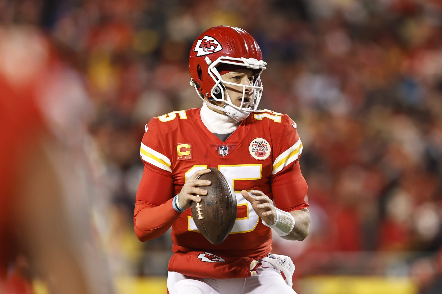 KANSAS CITY, MISSOURI - JANUARY 29: Patrick Mahomes #15 of the Kansas City Chiefs drops back to pass during the AFC Championship NFL football game between the Kansas City Chiefs and the Cincinnati Bengals at GEHA Field at Arrowhead Stadium on January 29, 2023 in Kansas City, Missouri. (Photo by Michael Owens/Getty Images)