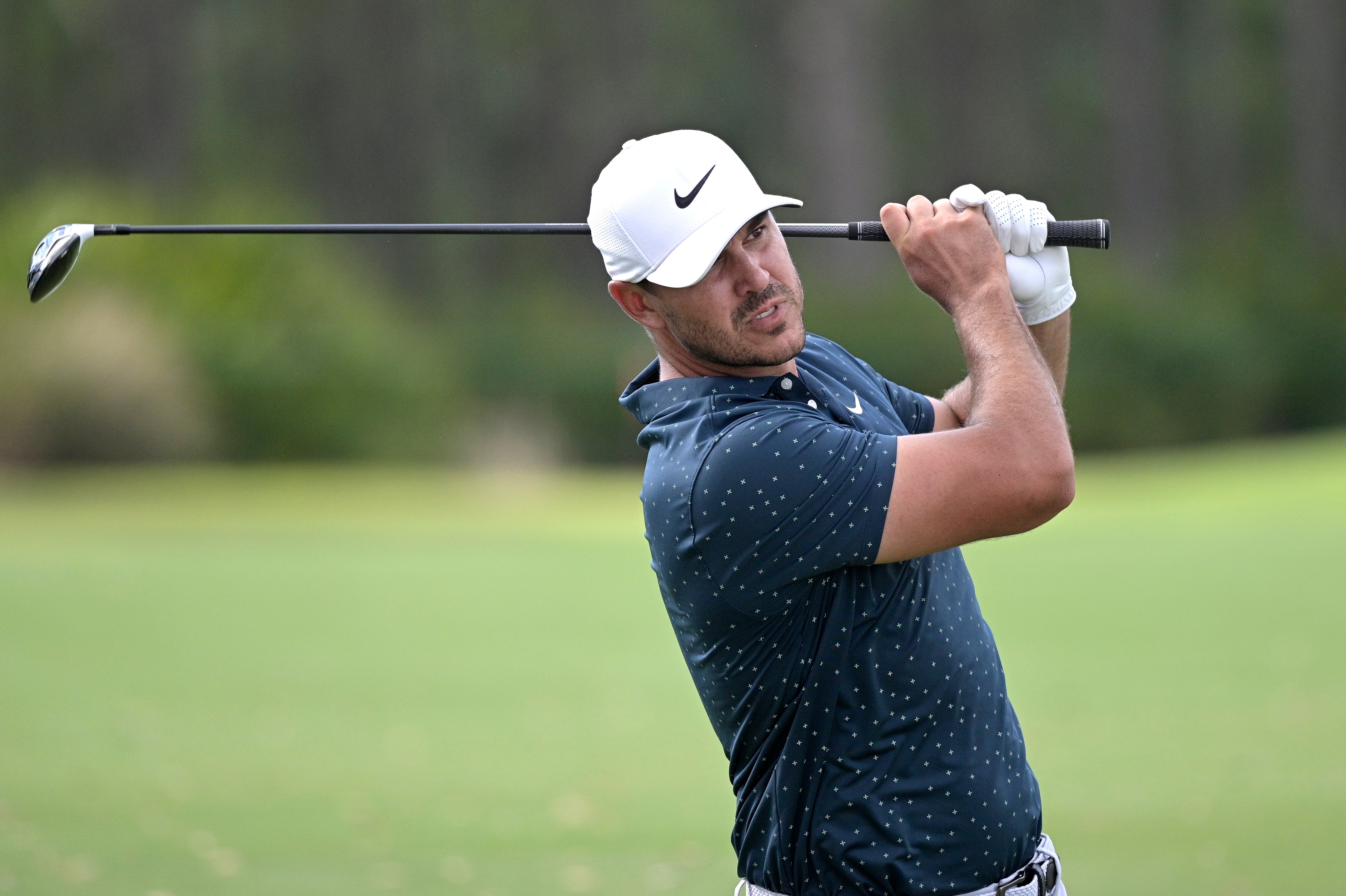 Brooks Koepka hits from the seventh fairway during the final round of the Workday Championship golf tournament Sunday, Feb. 28, 2021, in Bradenton, Fla. (AP Photo/Phelan M. Ebenhack)