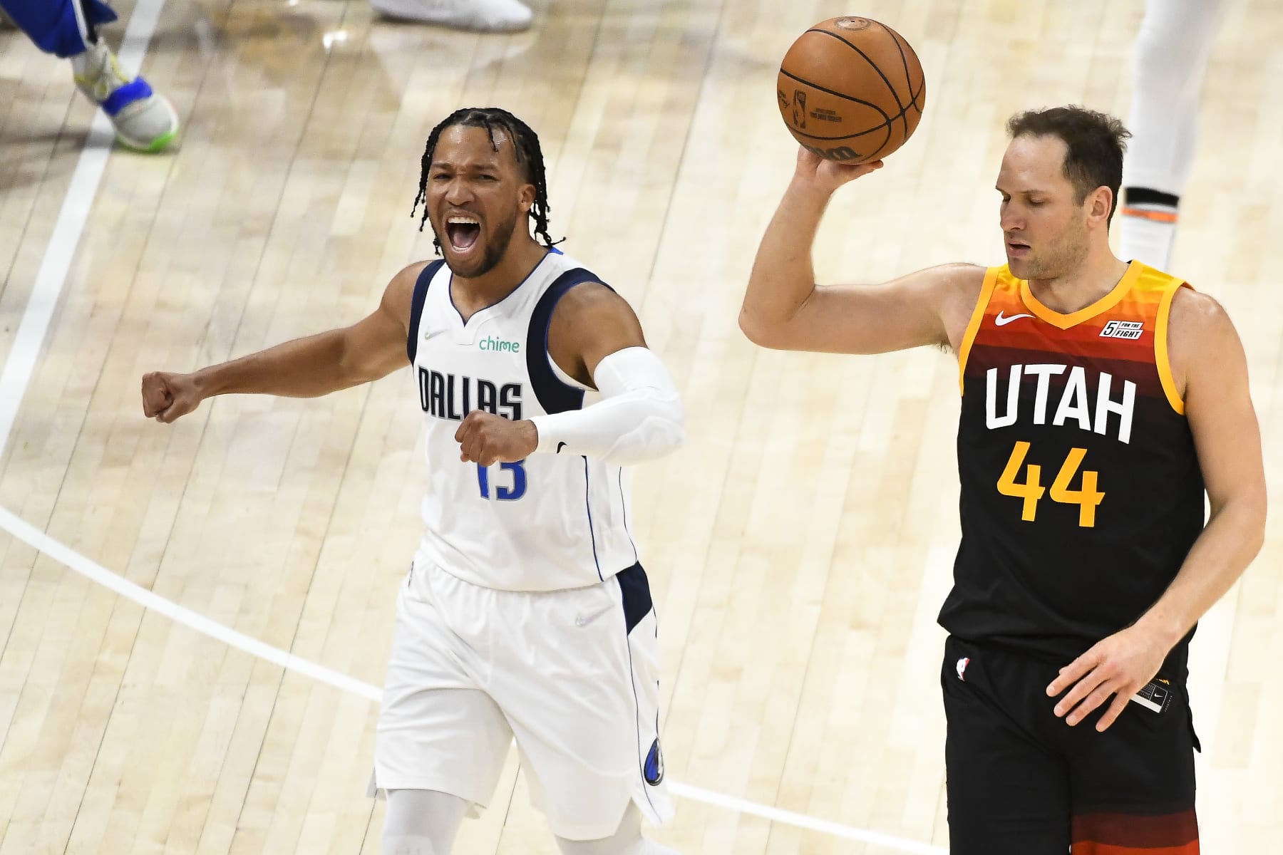 SALT LAKE CITY, UTAH - APRIL 28: Jalen Brunson #13 of the Dallas Mavericks celebrates a play during the second half of Game 6 of the Western Conference First Round Playoffs against the Utah Jazz at Vivint Smart Home Arena on April 28, 2022 in Salt Lake City, Utah. NOTE TO USER: User expressly acknowledges and agrees that, by downloading and/or using this Photograph, user is consenting to the terms and conditions of the Getty Images License Agreement. (Photo by Alex Goodlett/Getty Images)