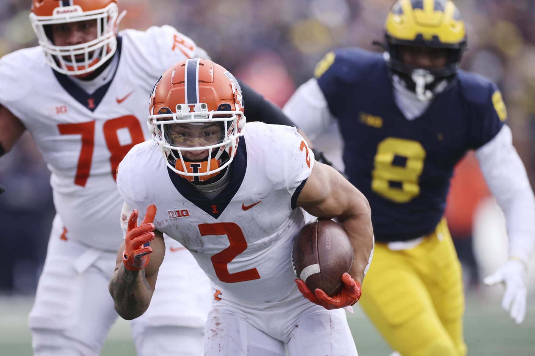ANN ARBOR, MI - NOVEMBER 19: Illinois Fighting Illini running back Chase Brown (2) runs toward the end zone for an 8-yard touchdown in the third quarter of a college football game against the Michigan Wolverines on November 19, 2022 at Michigan Stadium in Ann Arbor, Michigan. (Photo by Joe Robbins/Icon Sportswire via Getty Images)