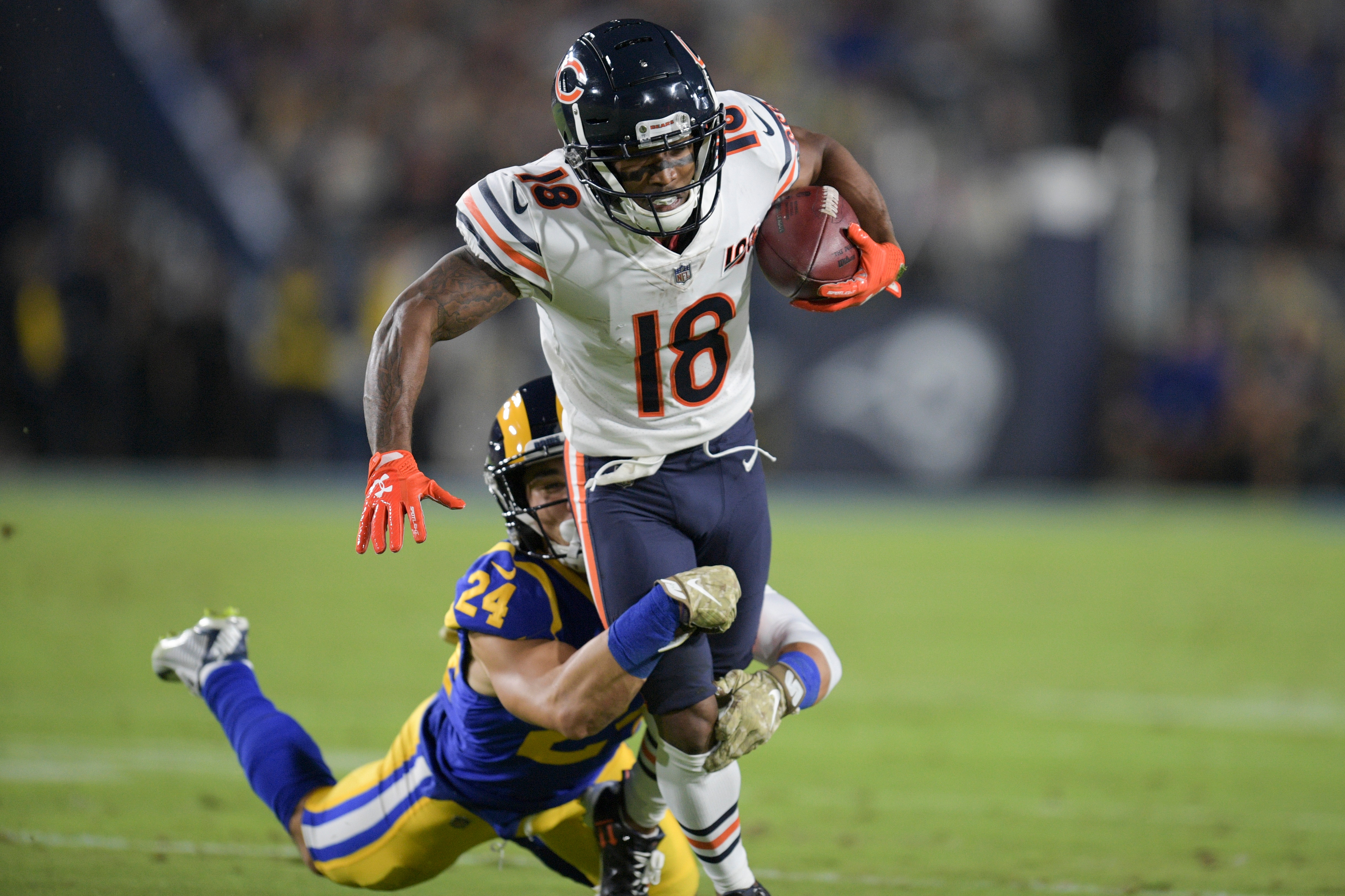 Chicago Bears wide receiver Taylor Gabriel is tackled by Los Angeles Rams safety Taylor Rapp during the first half of an NFL football game Sunday, Nov. 17, 2019, in Los Angeles. (AP Photo/Kyusung Gong)