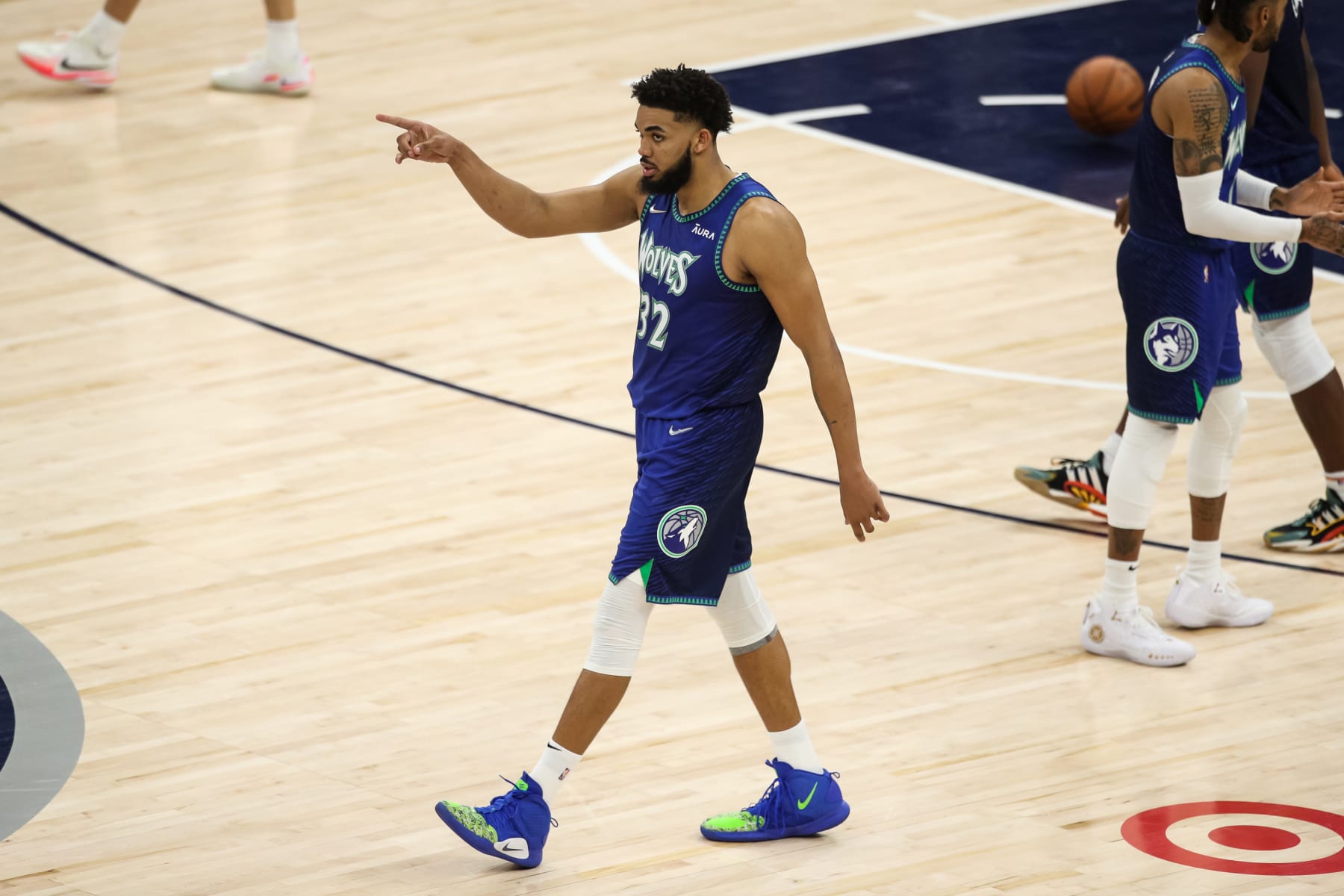 MINNEAPOLIS, MN - APRIL 29: Karl-Anthony Towns #32 of the Minnesota Timberwolves reacts to making a basket against the Memphis Grizzlies in the third quarter of the game during Game Six of the Western Conference First Round at Target Center on April 29, 2022 in Minneapolis, Minnesota. The Grizzlies defeated the Timberwolves 114-106 to advance to the Western Conference Semifinals. NOTE TO USER: User expressly acknowledges and agrees that, by downloading and or using this Photograph, user is consenting to the terms and conditions of the Getty Images License Agreement. (Photo by David Berding/Getty Images)