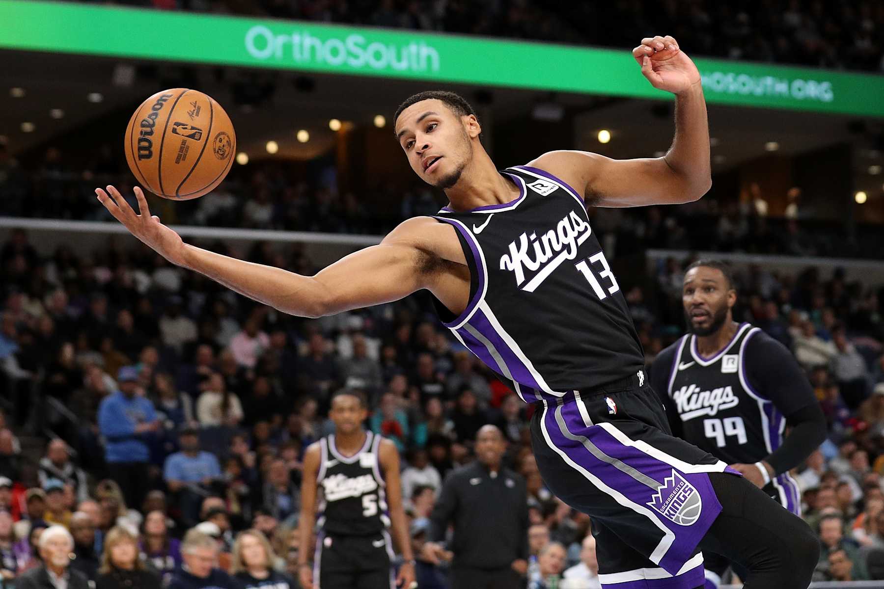 MEMPHIS, TENNESSEE - DECEMBER 05: Keegan Murray #13 of the Sacramento Kings handles the ball during the game against the Memphis Grizzlies at FedExForum on December 05, 2024 in Memphis, Tennessee. NOTE TO USER: User expressly acknowledges and agrees that, by downloading and or using this photograph, User is consenting to the terms and conditions of the Getty Images License Agreement. (Photo by Justin Ford/Getty Images)