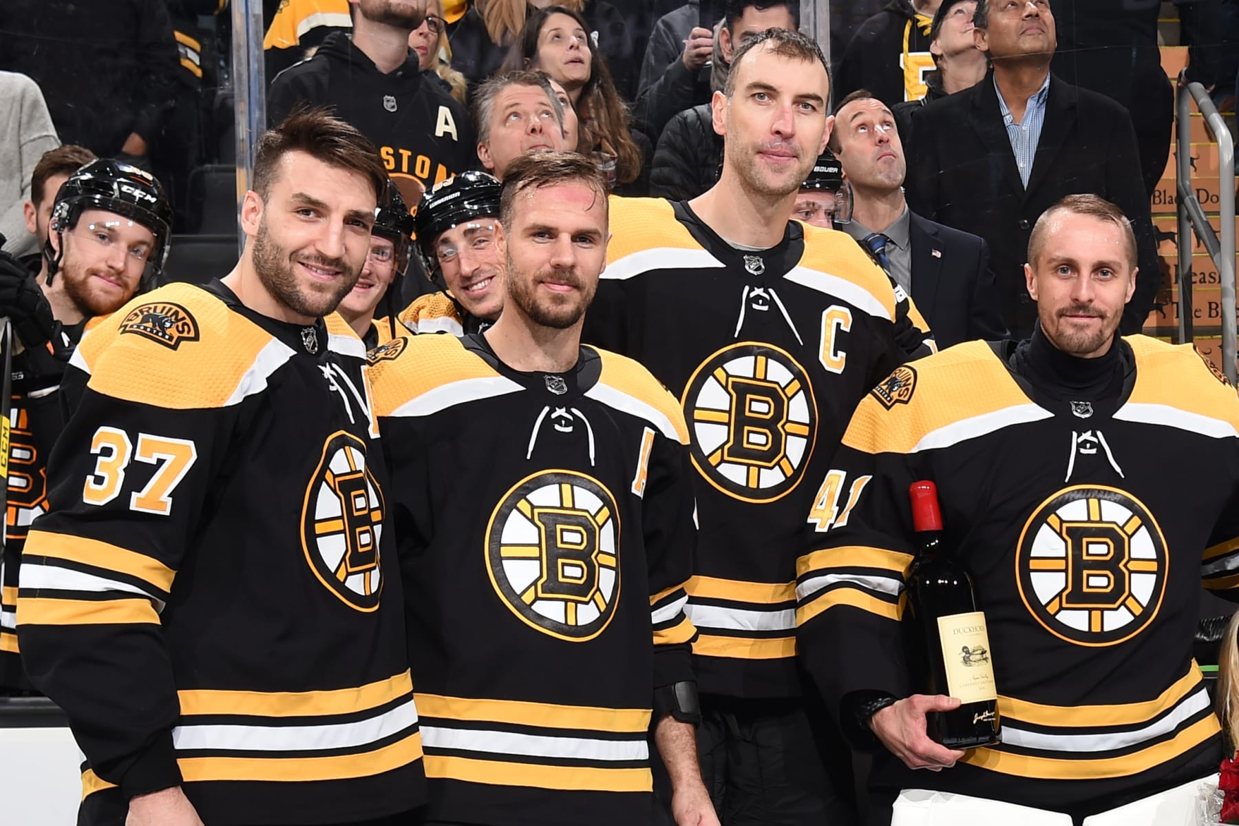 BOSTON, MA - FEBRUARY 25: Patrice Bergeron #37, David Krejci #46, Zdeno Chara #33 and Jaroslav Halak #41 of the Boston Bruins pose for a photo during a pre game ceremony against the Calgary Flames at the TD Garden on February 25, 2020 in Boston, Massachusetts. (Photo by Steve Babineau/NHLI via Getty Images)