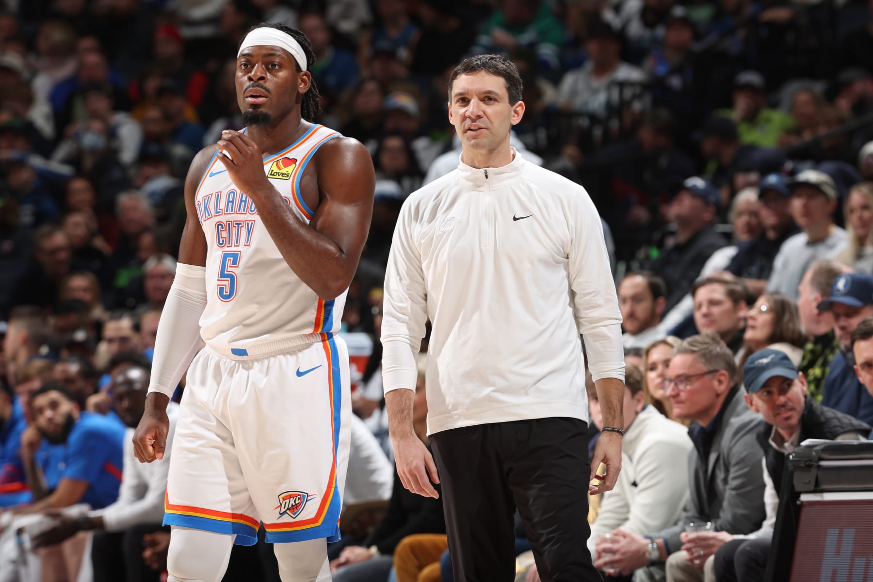 MINNEAPOLIS, MN -  JANUARY  20: Luguentz Dort #5 and Head Coach Mark Daigneault of the Oklahoma City Thunder look on during the game against the Minnesota Timberwolves on January 20, 2024 at Target Center in Minneapolis, Minnesota. NOTE TO USER: User expressly acknowledges and agrees that, by downloading and or using this Photograph, user is consenting to the terms and conditions of the Getty Images License Agreement. Mandatory Copyright Notice: Copyright 2024 NBAE (Photo by David Sherman/NBAE via Getty Images)