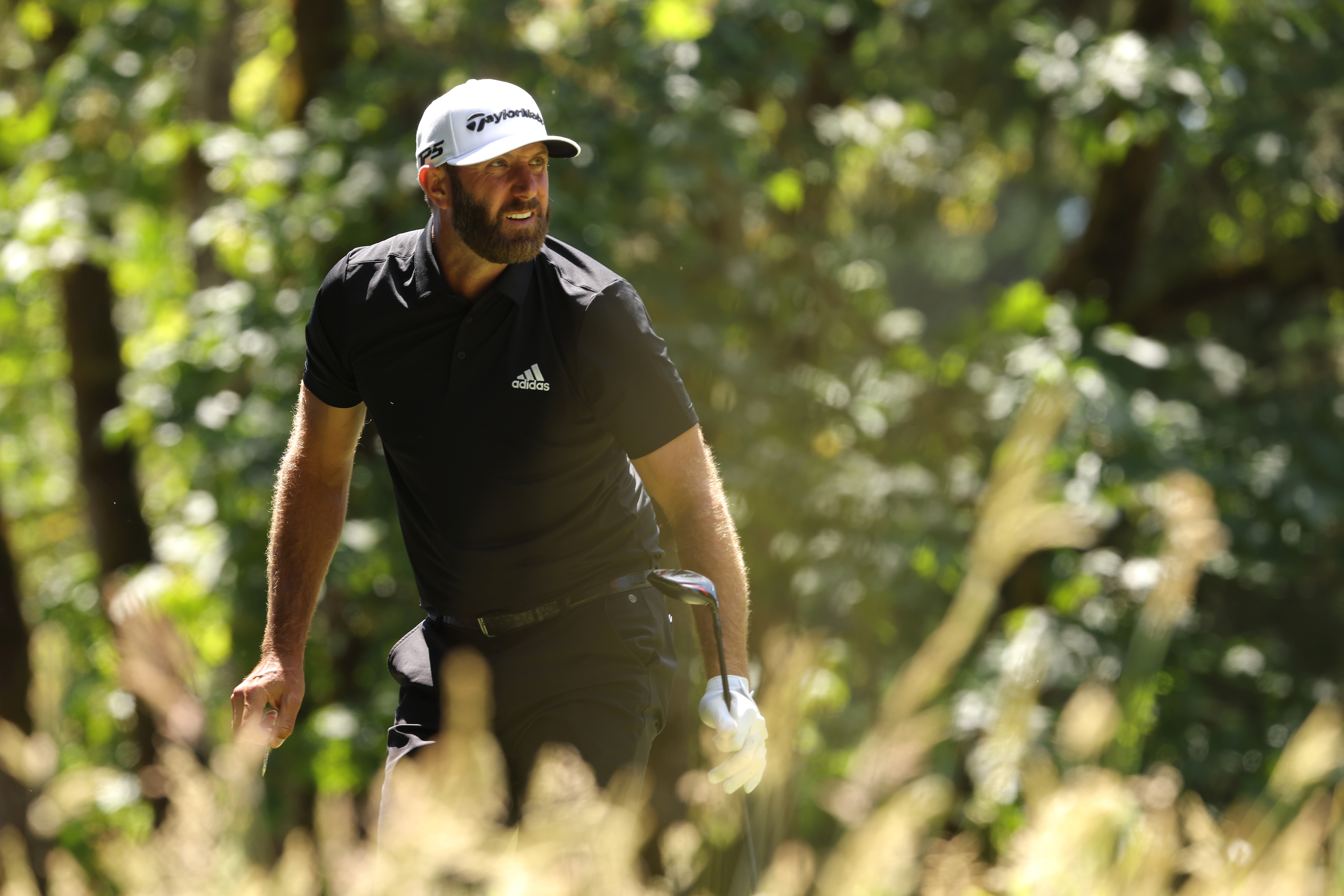NORTH PLAINS, OREGON - JULY 01: Team Captain Dustin Johnson of 4 Aces GC watches his shot on the fourth tee during day two of the LIV Golf Invitational - Portland at Pumpkin Ridge Golf Club on July 01, 2022 in North Plains, Oregon. (Photo by Jamie Squire/LIV Golf via Getty Images)