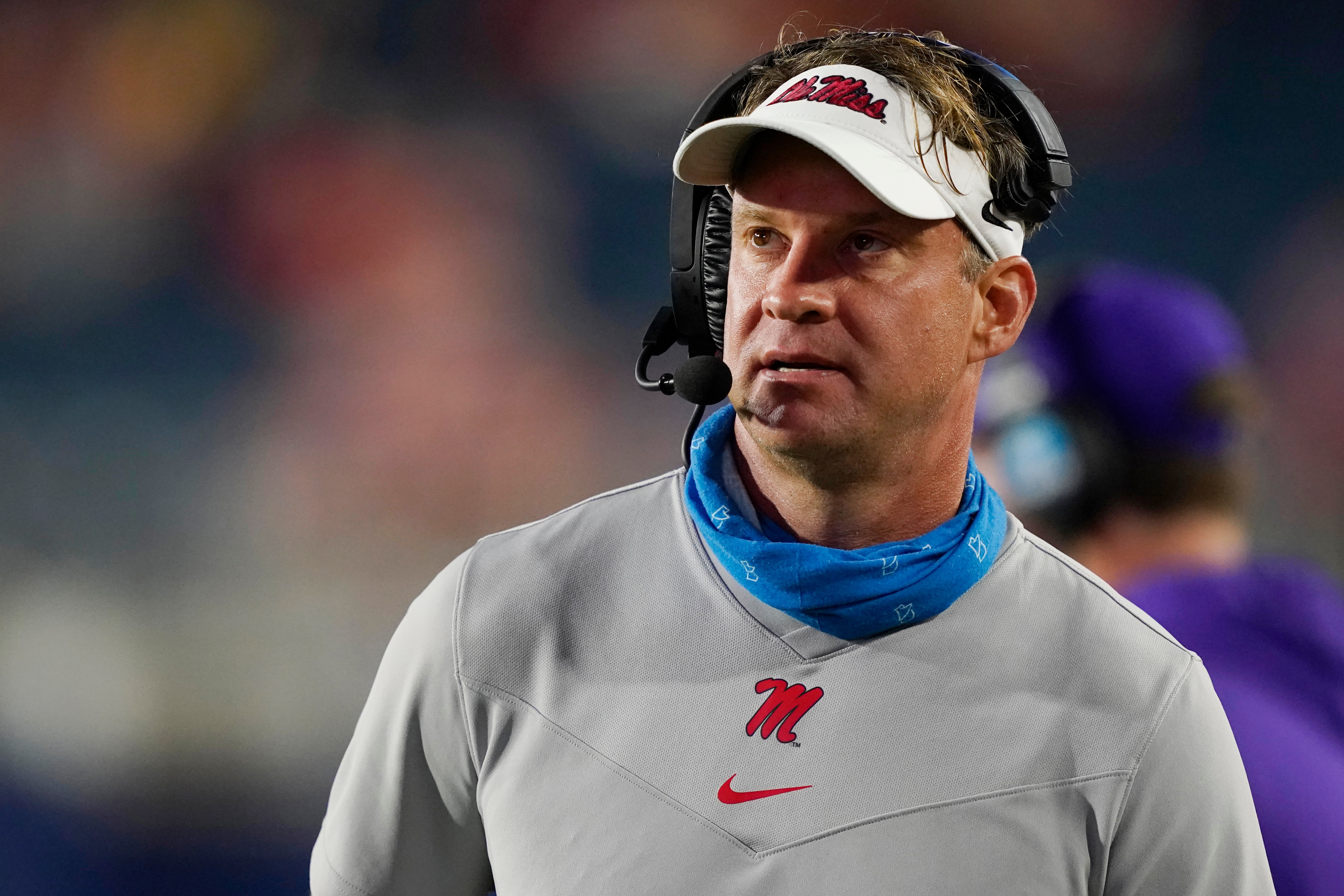 Mississippi head coach Lane Kiffin watches a replay during the second half of the team's NCAA college football game against Tulane on Saturday, Sept. 18, 2021, in Oxford, Miss. Mississippi won 61-21. (AP Photo/Rogelio V. Solis)