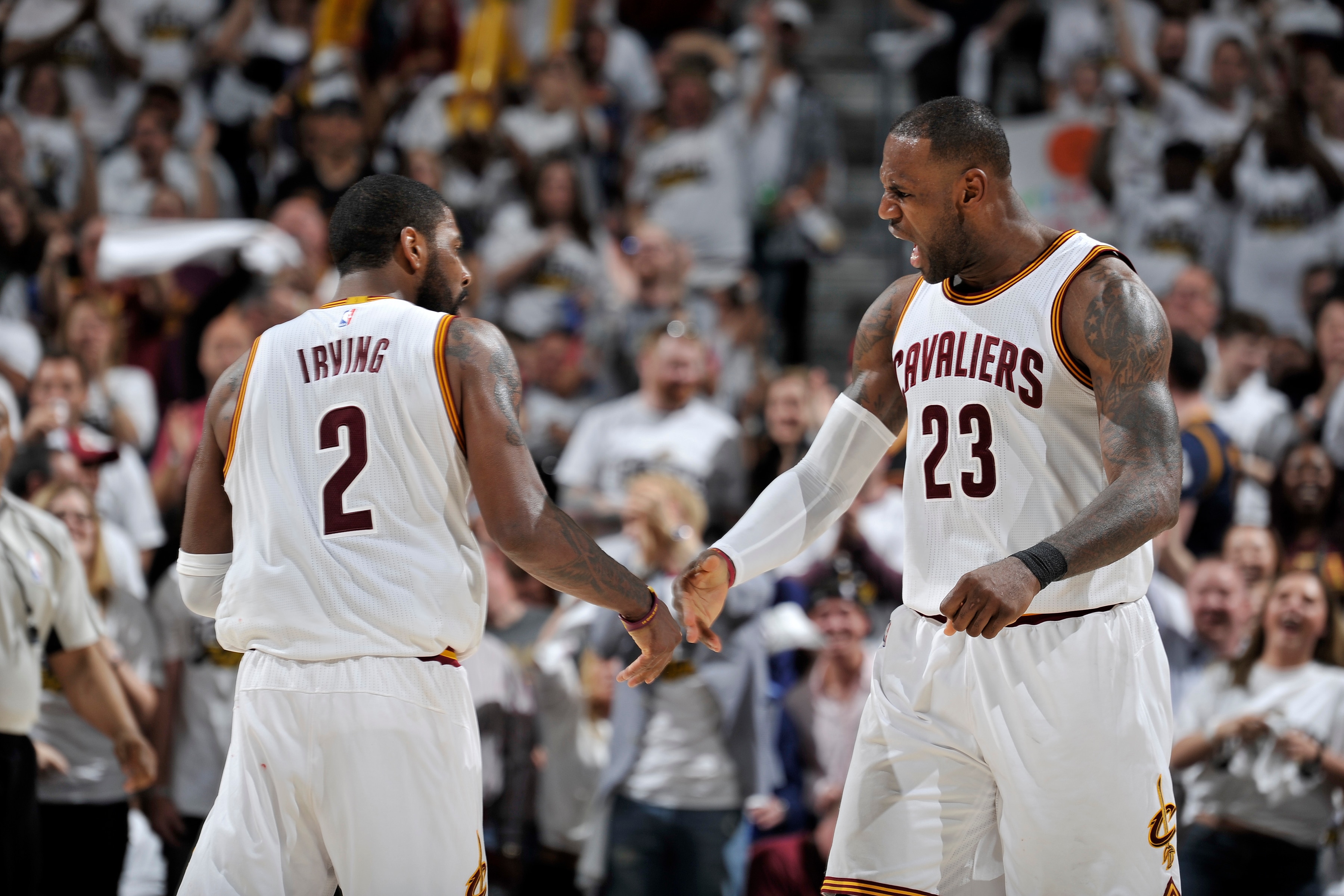 CLEVELAND, OH - APRIL 15:  Kyrie Irving #2 and LeBron James #23 of the Cleveland Cavaliers shake hands against the Indiana Pacers in Round One of the Eastern Conference Playoffs during the 2017 NBA Playoffs on April 15, 2017 at Quicken Loans Arena in Cleveland, Ohio. NOTE TO USER: User expressly acknowledges and agrees that, by downloading and/or using this photograph, user is consenting to the terms and conditions of the Getty Images License Agreement. Mandatory Copyright Notice: Copyright 2017 NBAE  (Photo by David Liam Kyle/NBAE via Getty Images)
