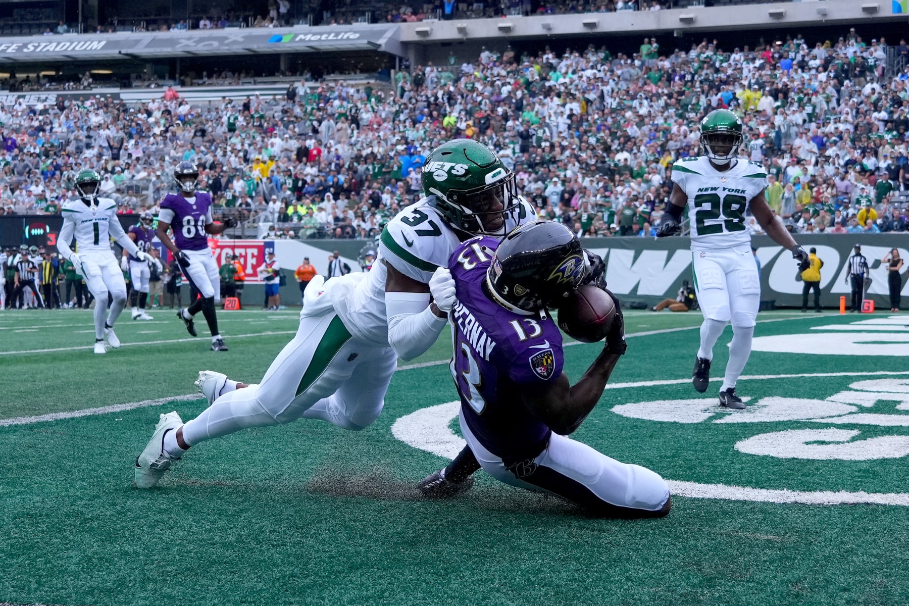 EAST RUTHERFORD, NEW JERSEY - SEPTEMBER 11: Devin Duvernay #13 of the Baltimore Ravens scores a touchdown during the second quarter of the game at MetLife Stadium on September 11, 2022 in East Rutherford, New Jersey. (Photo by Mitchell Leff/Getty Images) EAST RUTHERFORD, NEW JERSEY - SEPTEMBER 11: Devin Duvernay #13 of the Baltimore Ravens scores a touchdown during the second quarter of the game at MetLife Stadium on September 11, 2022 in East Rutherford, New Jersey. (Photo by Mitchell Leff/Getty Images)