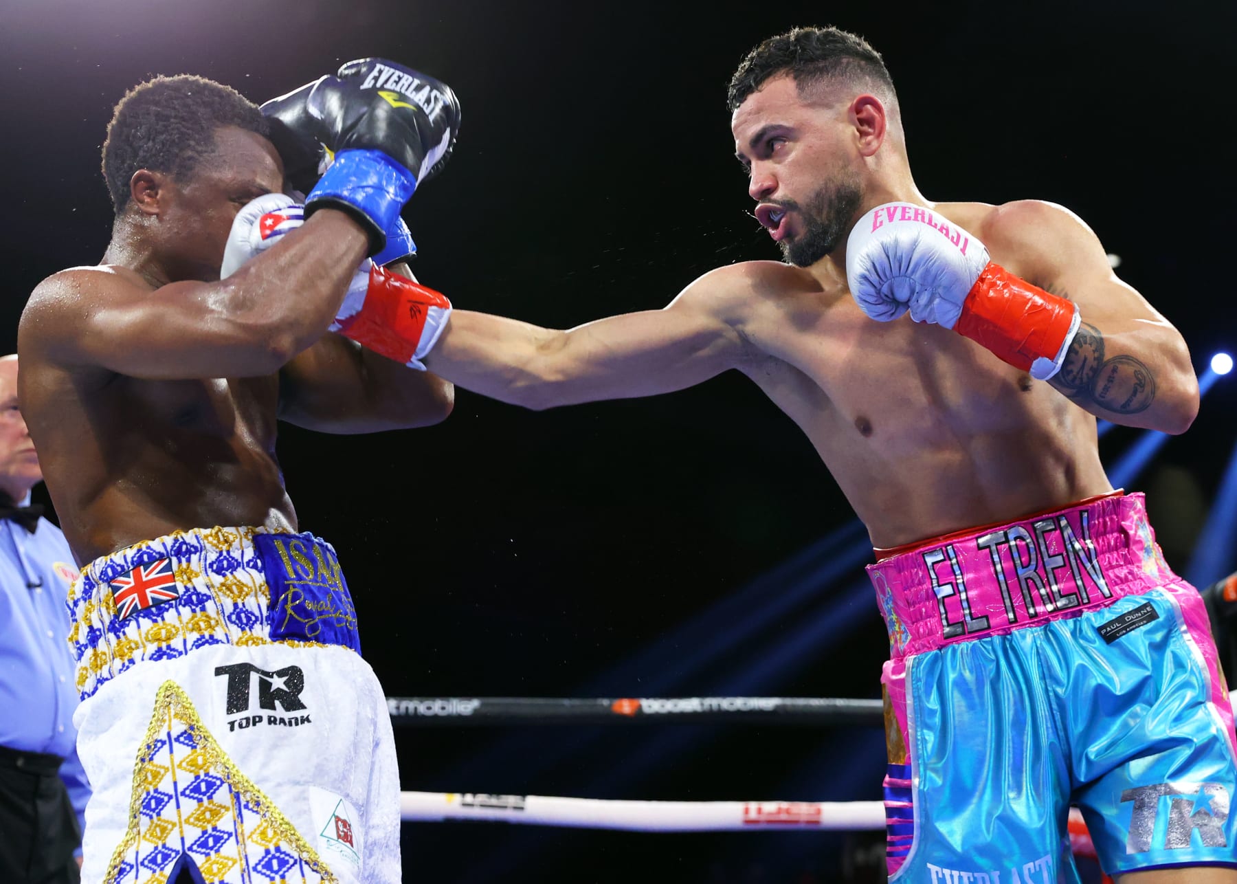 CATOOSA, OKLAHOMA - APRIL 1: Isaac Dogboe (L) and Robeisy Ramirez (R) exchange punches during their WBO featherweight championship fight at Hard Rock Hotel & Casino Tulsa on April 1, 2023 in Catoosa, Oklahoma. (Photo by Mikey Williams/Top Rank Inc via Getty Images)