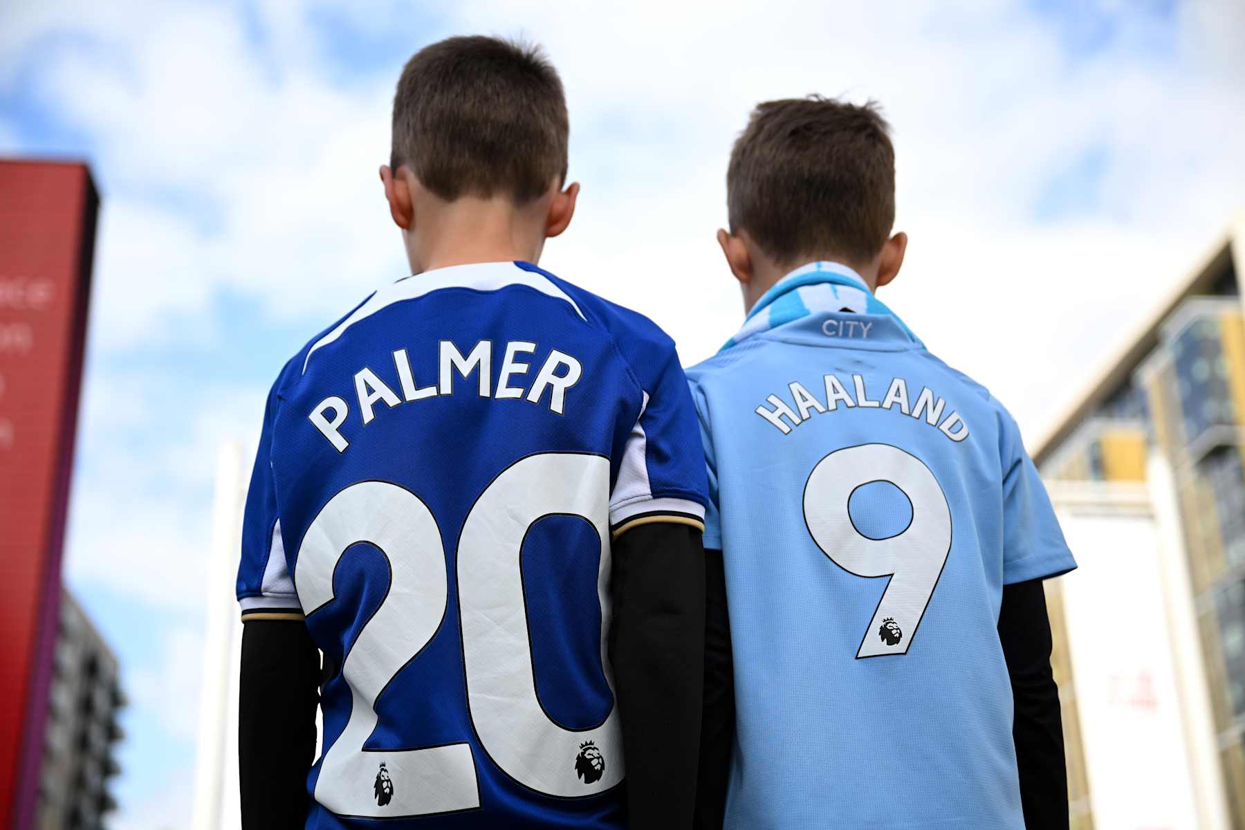 LONDON, ENGLAND - APRIL 20: Fan of Chelsea wearing a Cole Palmer shirt poses for a photo with a Manchester City fan wearing a Erling Haaland shirt outside the stadium prior to the Emirates FA Cup Semi Final match between Manchester City and Chelsea at Wembley Stadium on April 20, 2024 in London, England. (Photo by Justin Setterfield - The FA/The FA via Getty Images)