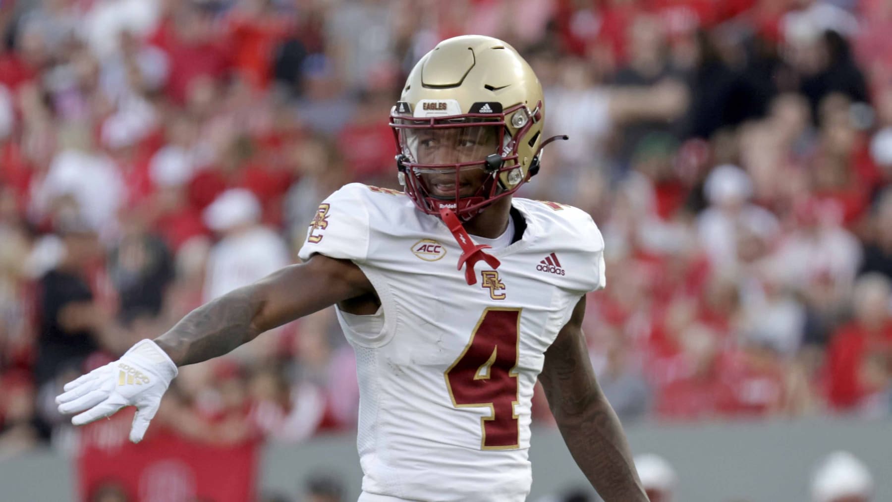 Boston College wide receiver Zay Flowers (4) gets ready to run a pass pattern during the first half of an NCAA college football game against North Carolina State Saturday, Nov. 12, 2022, in Raleigh, N.C. (AP Photo/Chris Seward)