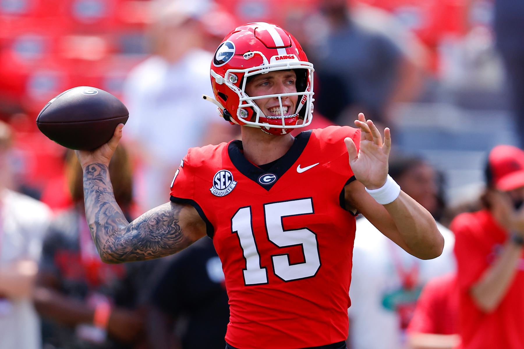 ATHENS, GEORGIA - SEPTEMBER 7: Carson Beck #15 of the Georgia Bulldogs warms up prior to the game against the Tennessee Tech Golden Eagles at Sanford Stadium on September 7, 2024 in Athens, Georgia. (Photo by Todd Kirkland/Getty Images)