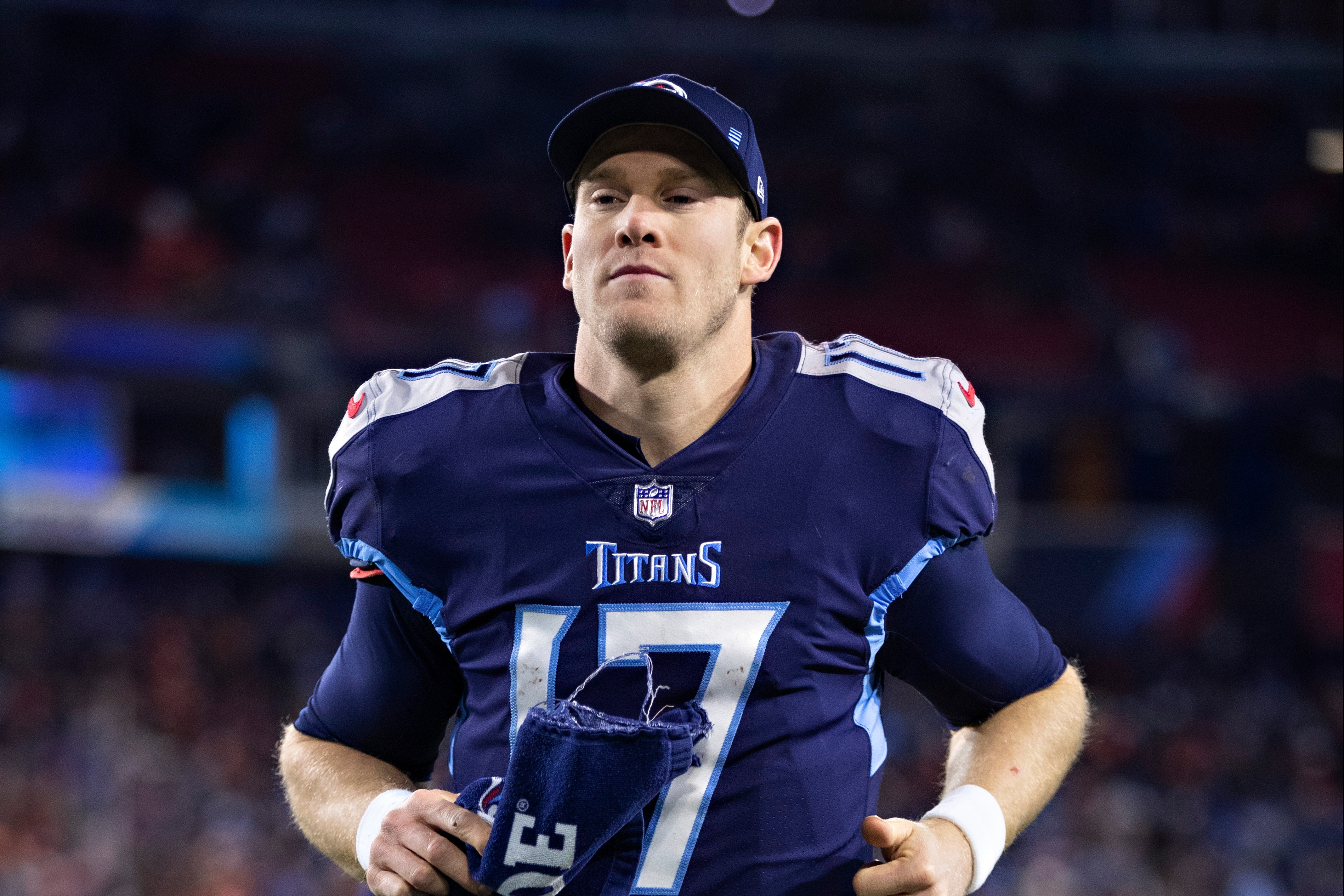 NASHVILLE, TENNESSEE - JANUARY 22: Ryan Tannehill #17 of the Tennessee Titans jogs off the field after a game against the Cincinnati Bengals in the AFC Divisional Playoff game at Nissan Stadium on January 22, 2022 in Nashville, Tennessee. The Bengals defeated the Titans 19-16.  (Photo by Wesley Hitt/Getty Images)