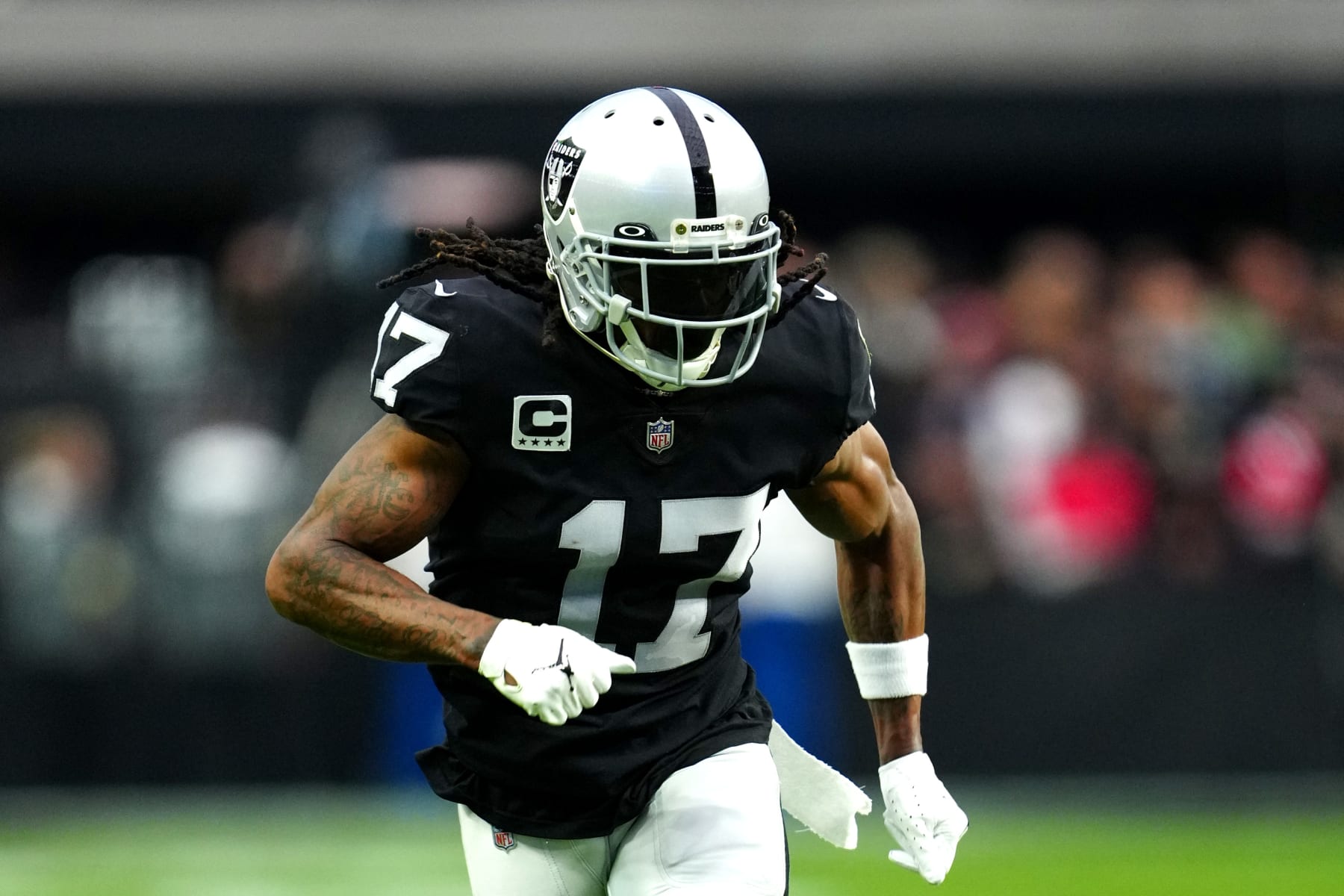 LAS VEGAS, NEVADA - DECEMBER 18: Davante Adams #17 of the Las Vegas Raiders in action against the New England Patriots during the first half of the game at Allegiant Stadium on December 18, 2022 in Las Vegas, Nevada. (Photo by Jeff Bottari/Getty Images)