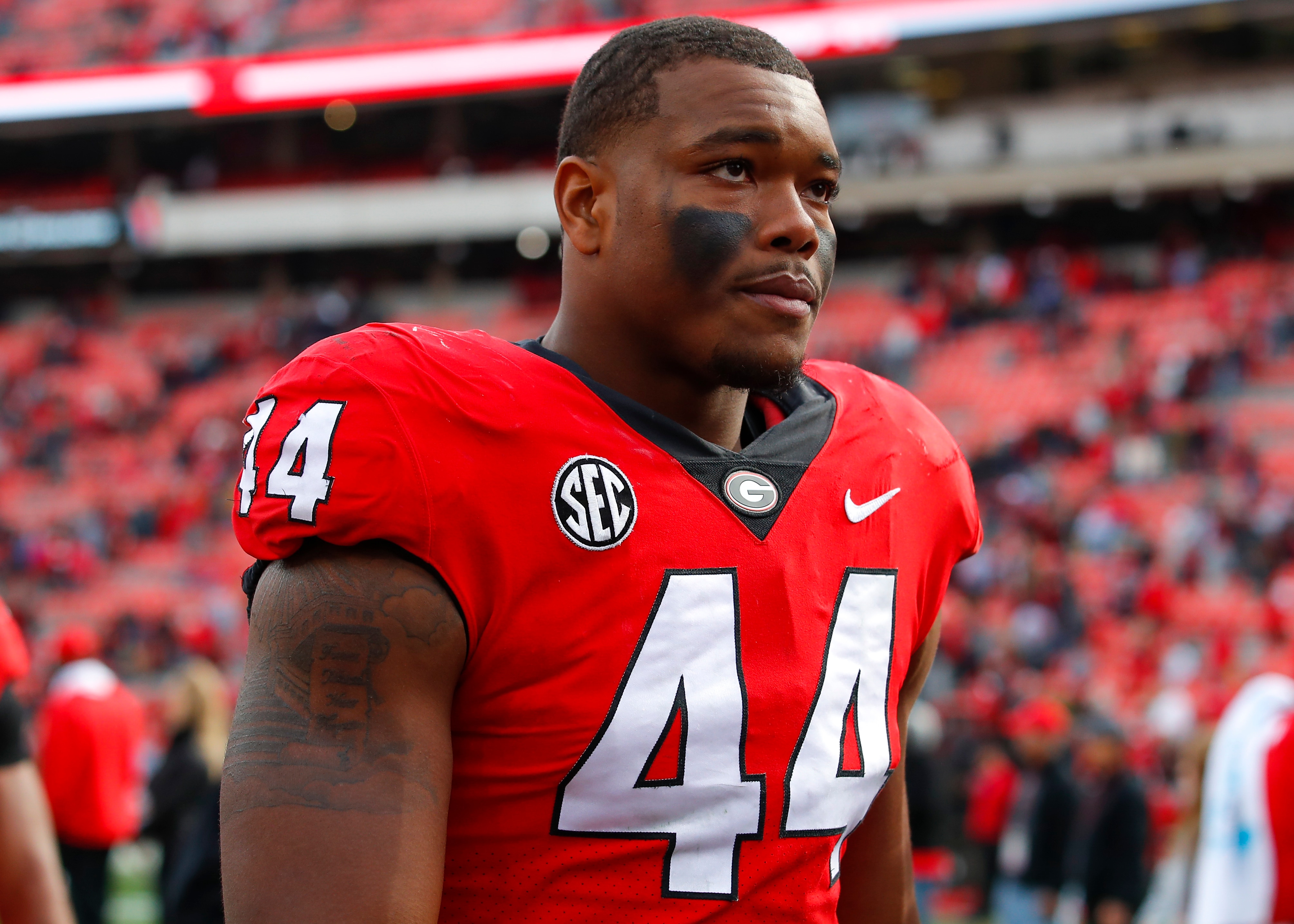 ATHENS, GA - NOVEMBER 06: Travon Walker #44 of the Georgia Bulldogs leaves the field at the conclusion of the game against the Missouri Tigers at Sanford Stadium on November 6, 2021 in Athens, Georgia. (Photo by Todd Kirkland/Getty Images)