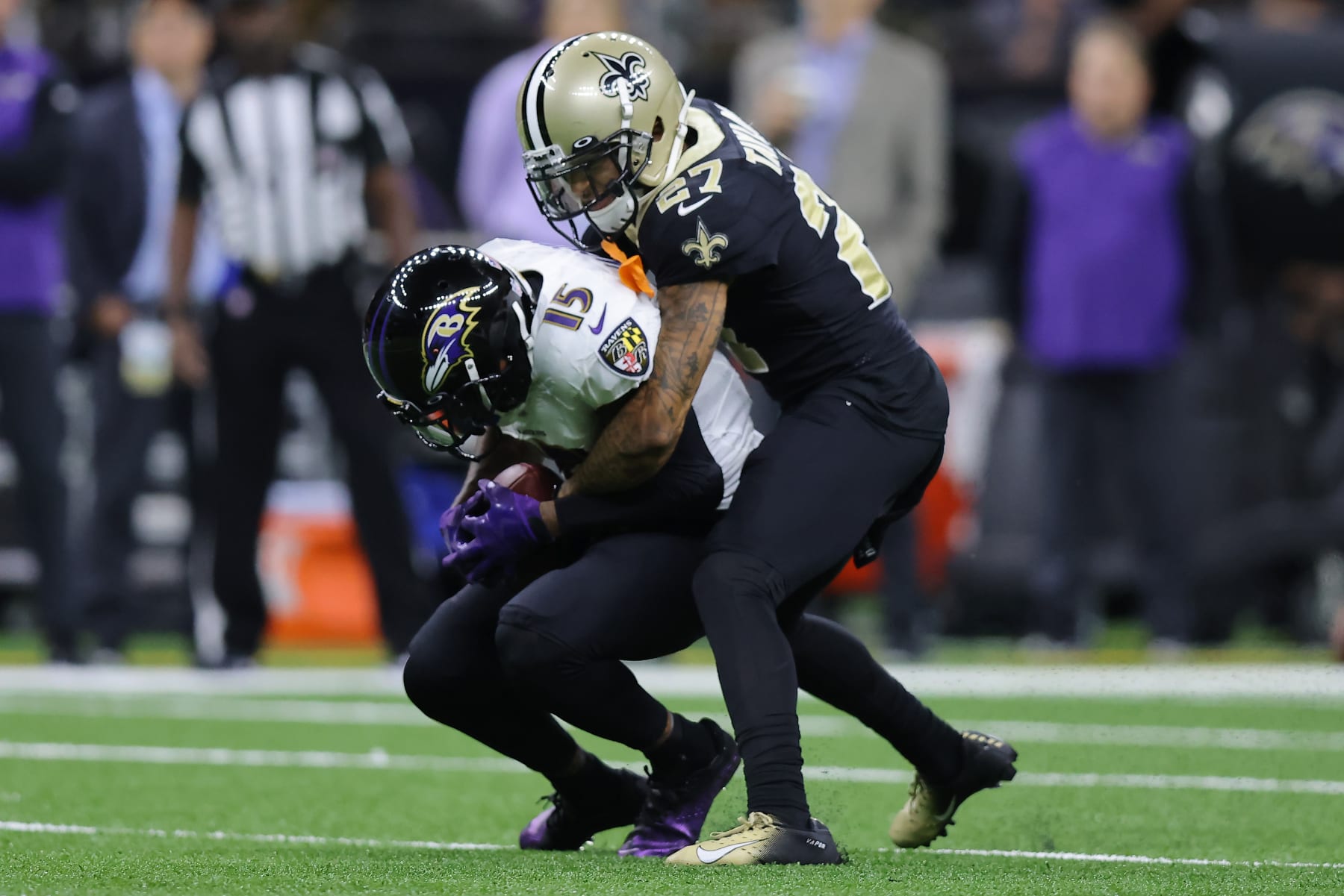NEW ORLEANS, LOUISIANA - NOVEMBER 07: DeSean Jackson #15 of the Baltimore Ravens catches a pass and is tackled by Alontae Taylor #27 of the New Orleans Saints during the first quarter at Caesars Superdome on November 07, 2022 in New Orleans, Louisiana. (Photo by Jonathan Bachman/Getty Images) NEW ORLEANS, LOUISIANA - NOVEMBER 07: DeSean Jackson #15 of the Baltimore Ravens catches a pass and is tackled by Alontae Taylor #27 of the New Orleans Saints during the first quarter at Caesars Superdome on November 07, 2022 in New Orleans, Louisiana. (Photo by Jonathan Bachman/Getty Images)