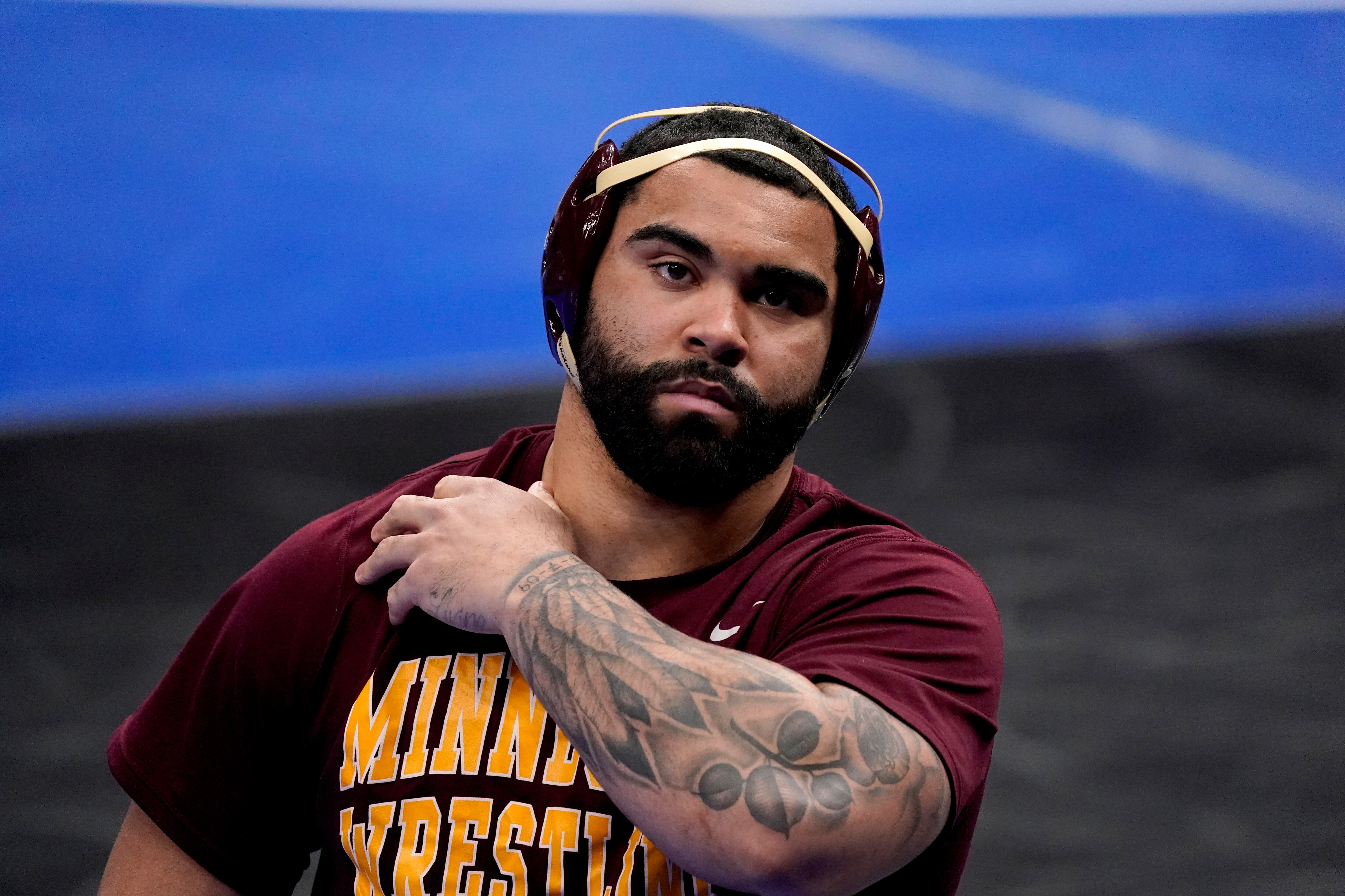 Minnesota's Gable Steveson prepares to take on Penn State's Greg Kerkvliet during their 285-pound match in the quarterfinal round of the NCAA wrestling championships Friday, March 19, 2021, in St. Louis. (AP Photo/Jeff Roberson)