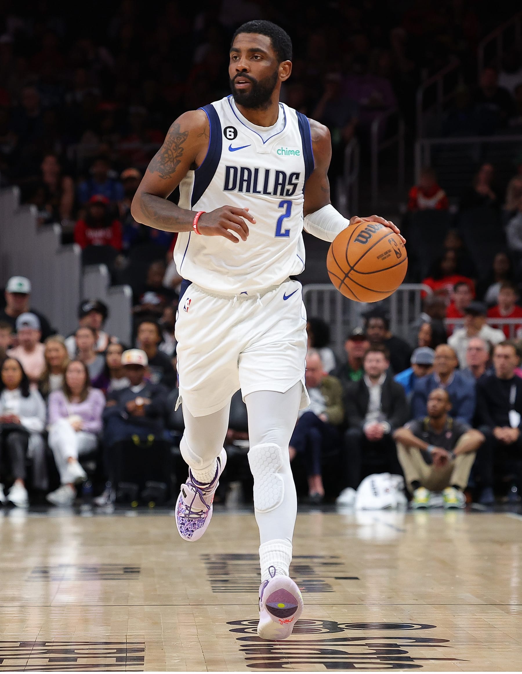 ATLANTA, GEORGIA - APRIL 02:  Kyrie Irving #2 of the Dallas Mavericks drives against the Atlanta Hawks during the second quarter at State Farm Arena on April 02, 2023 in Atlanta, Georgia.  NOTE TO USER: User expressly acknowledges and agrees that, by downloading and or using this photograph, User is consenting to the terms and conditions of the Getty Images License Agreement.  (Photo by Kevin C. Cox/Getty Images)
