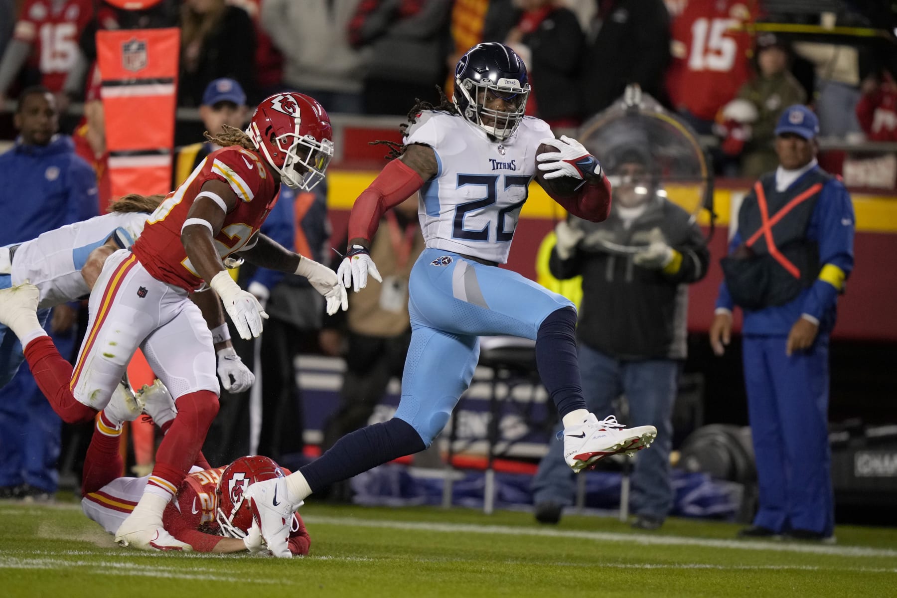Tennessee Titans running back Derrick Henry (22) runs with the ball during the first half of an NFL football game Sunday, Nov. 6, 2022, in Kansas City, Mo. (AP Photo/Charlie Riedel) Tennessee Titans running back Derrick Henry (22) runs with the ball during the first half of an NFL football game Sunday, Nov. 6, 2022, in Kansas City, Mo. (AP Photo/Charlie Riedel)