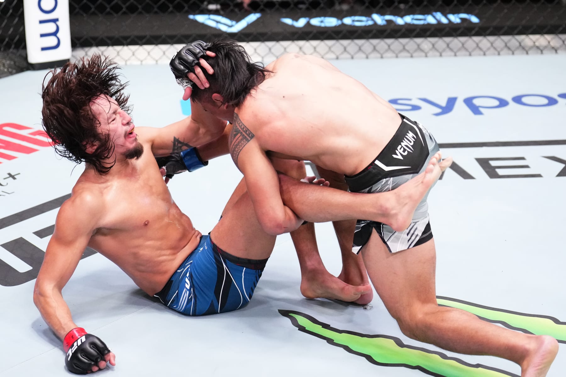 LAS VEGAS, NEVADA - NOVEMBER 19: (R-L) Kevin Natividad takes down Ricky Turcios in a bantamweight fight during the UFC Fight Night event at UFC APEX on November 19, 2022 in Las Vegas, Nevada. (Photo by Chris Unger/Zuffa LLC)