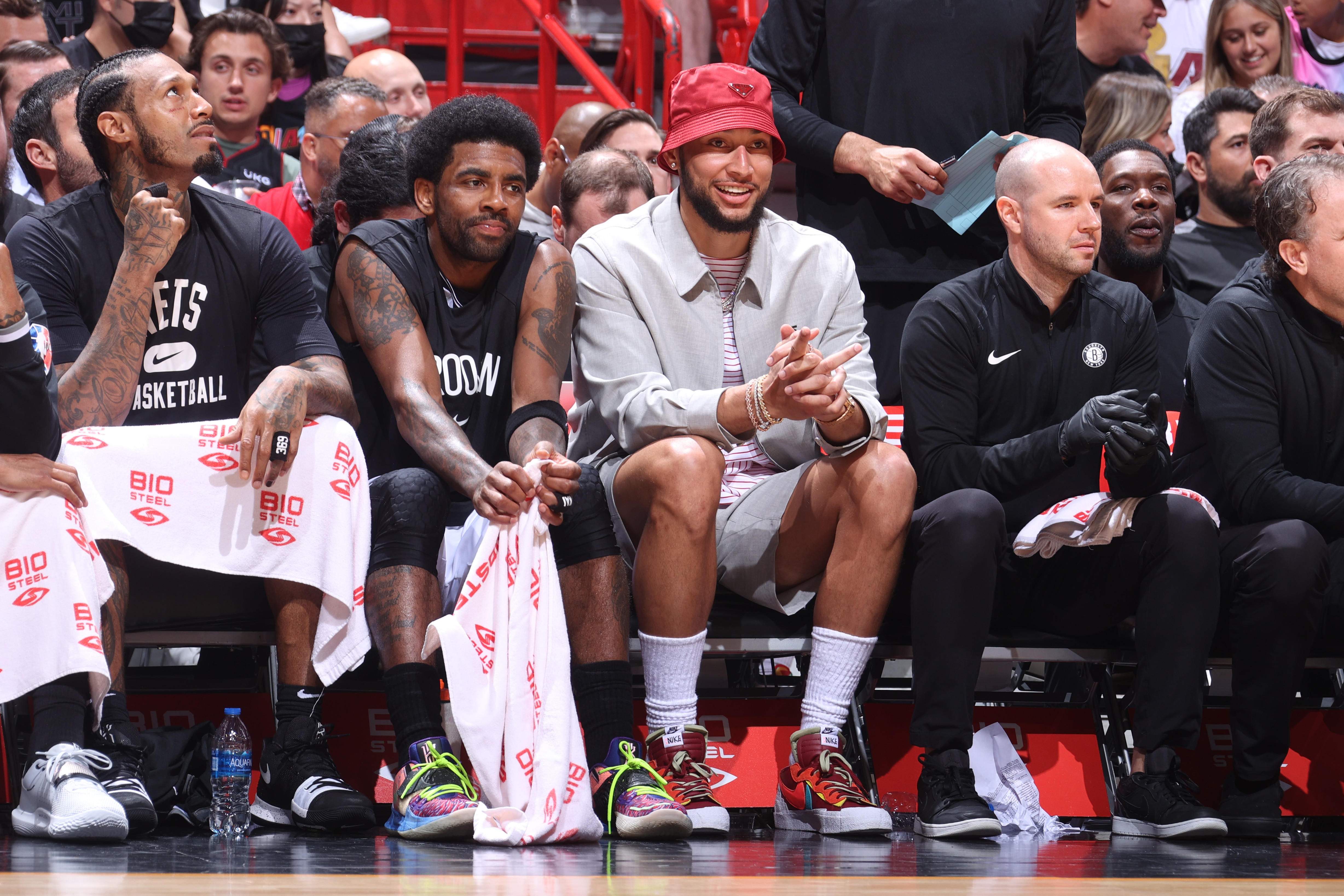 MIAMI, FL - MARCH 26: Kyrie Irving #11 of the Brooklyn Nets and Ben Simmons #10 of the Brooklyn Nets smile during the game against the Miami Heat on March 26, 2022 at FTX Arena in Miami, Florida. NOTE TO USER: User expressly acknowledges and agrees that, by downloading and or using this Photograph, user is consenting to the terms and conditions of the Getty Images License Agreement. Mandatory Copyright Notice: Copyright 2022 NBAE (Photo by Nathaniel S. Butler/NBAE via Getty Images)