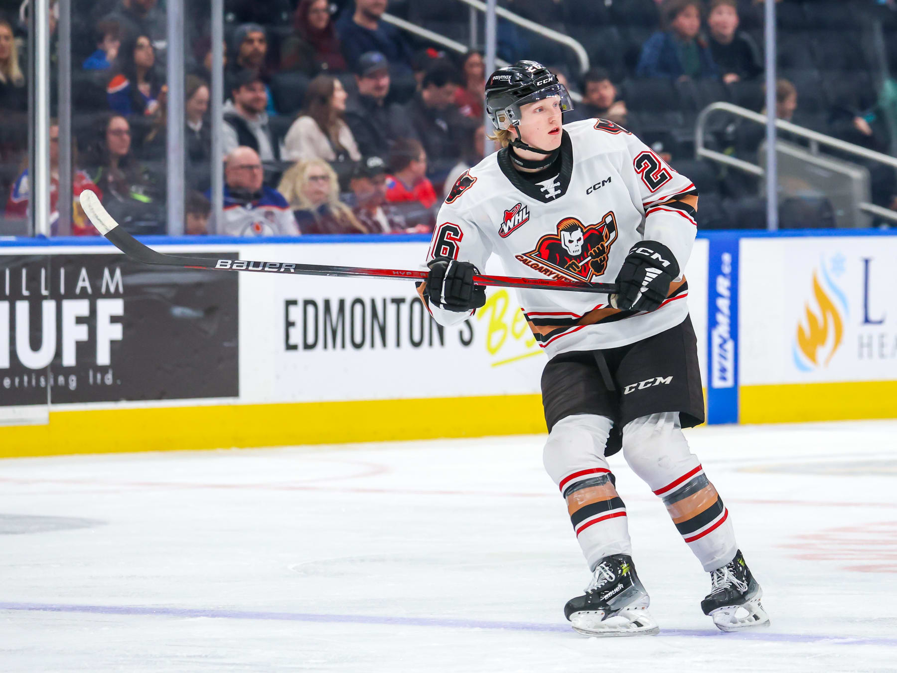 EDMONTON, CANADA - FEBRUARY 02: Carter Yakemchuk #26 of the Calgary Hitmen skates during first-period action against the Edmonton Oil Kings at Rogers Place on February 02, 2024 in Edmonton, Canada. (Photo by Jonathan Kozub/Getty Images)