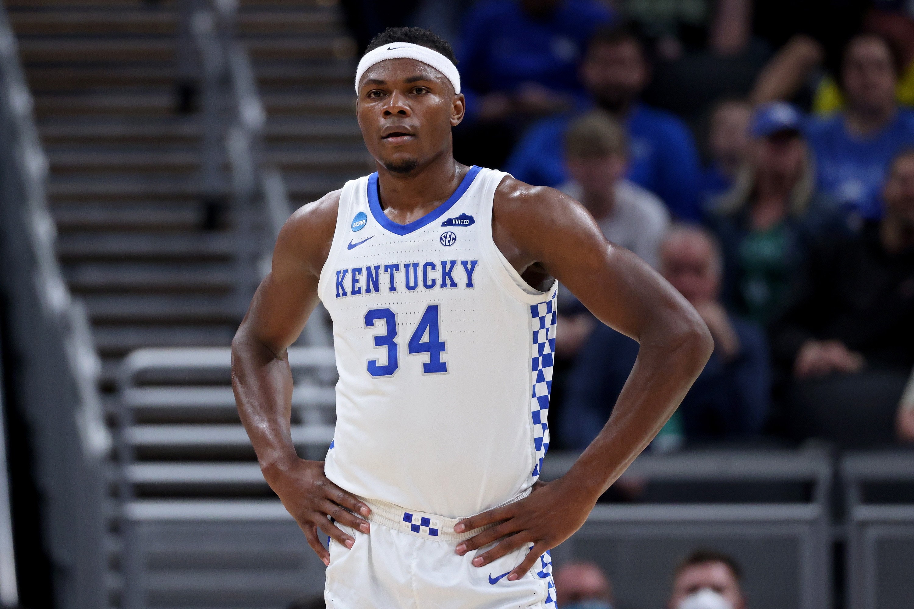 INDIANAPOLIS, INDIANA - MARCH 17: Oscar Tshiebwe #34 of the Kentucky Wildcats looks on in the first half against the Saint Peter's Peacocks during the first round of the 2022 NCAA Men's Basketball Tournament at Gainbridge Fieldhouse on March 17, 2022 in Indianapolis, Indiana. (Photo by Dylan Buell/Getty Images)