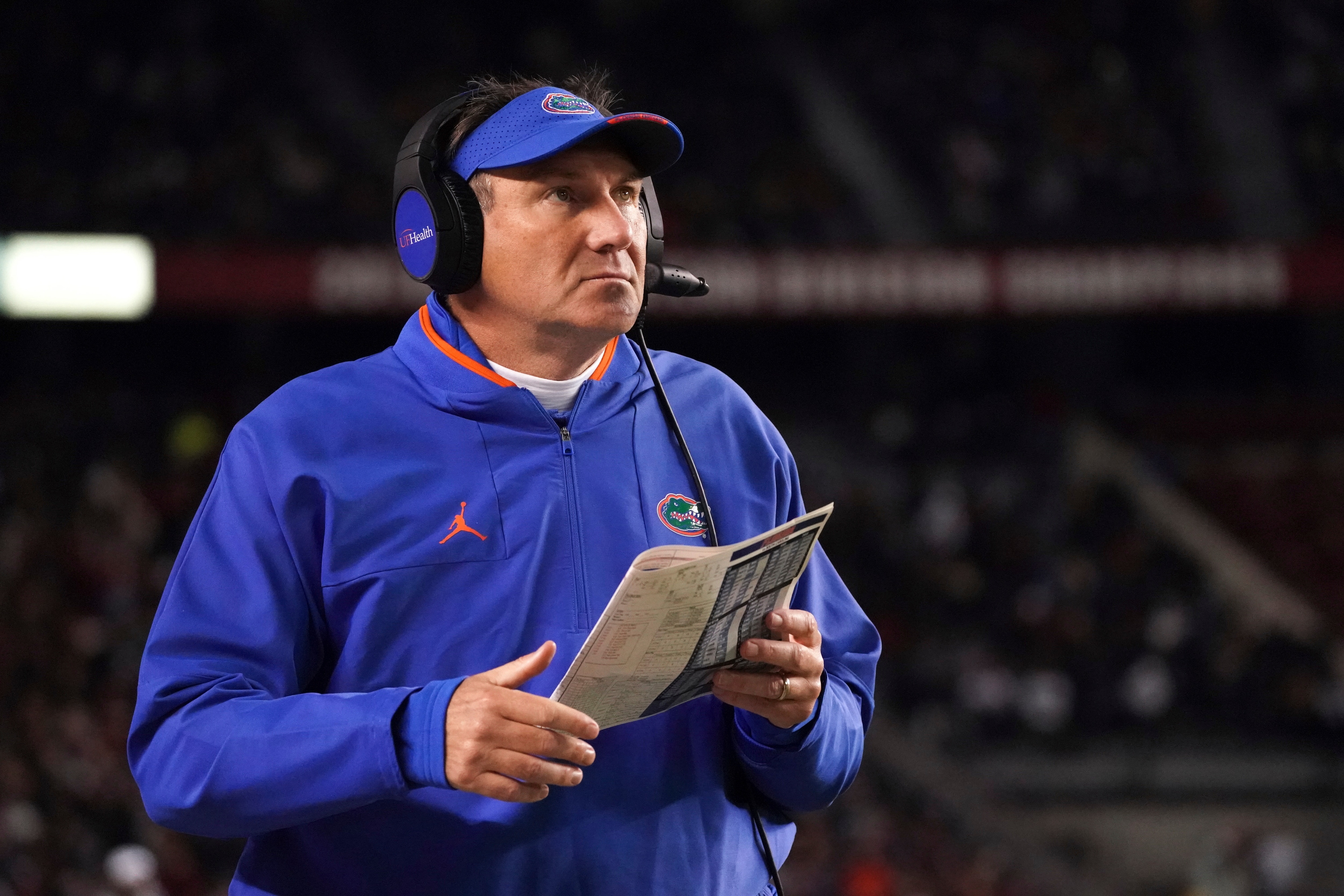 Florida head coach Dan Mullen watches a video replay during the first half of an NCAA college football game against South Carolina Saturday, Nov. 6, 2021, in Columbia, S.C. South Carolina won 40-17. (AP Photo/Sean Rayford)