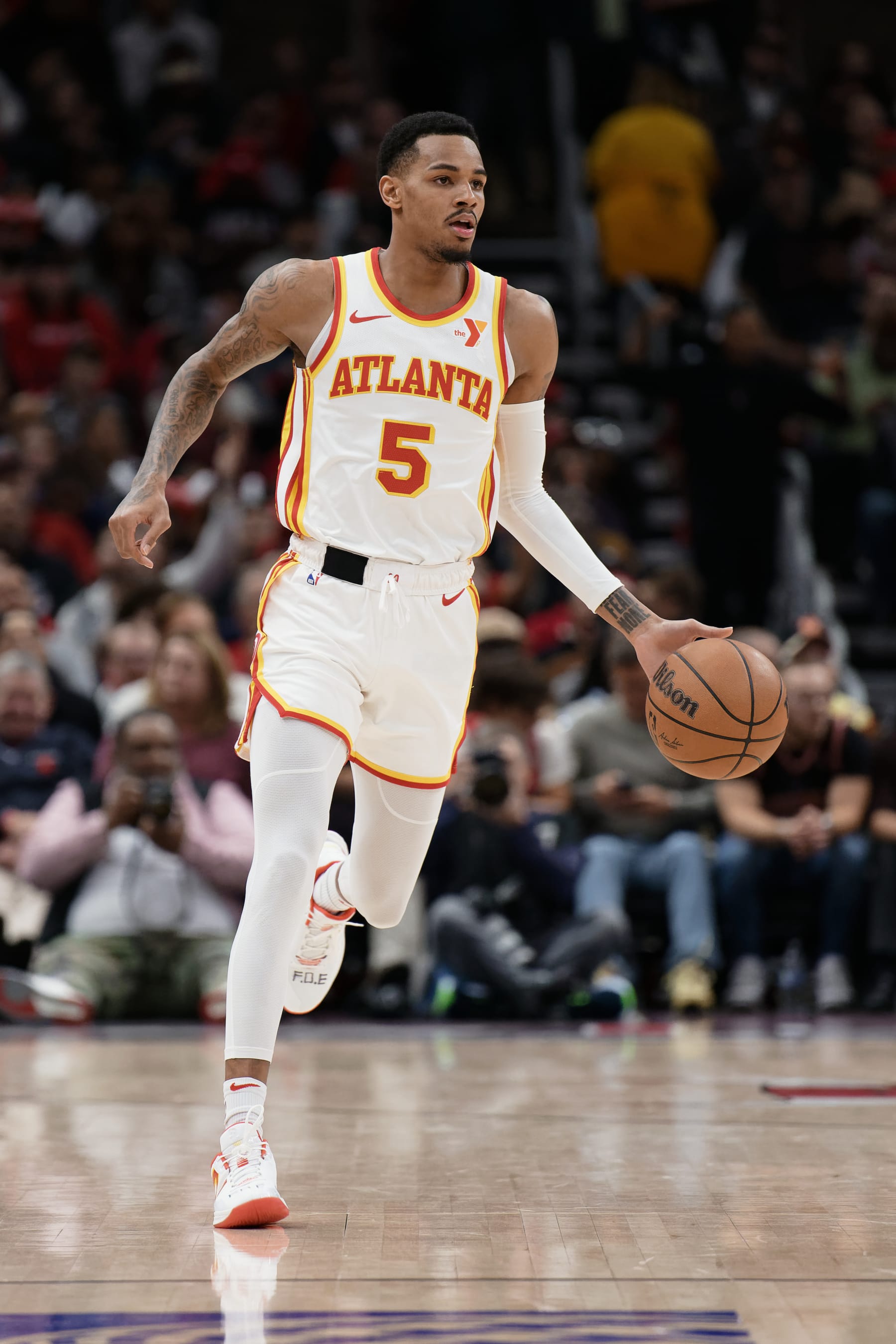 CHICAGO, ILLINOIS - APRIL 17:  Dejounte Murray #5 of the Atlanta Hawks controls the ball against the Chicago Bulls on April 17, 2024 at United Center in Chicago, Illinois.   NOTE TO USER: User expressly acknowledges and agrees that, by downloading and or using this photograph, User is consenting to the terms and conditions of the Getty Images License Agreement.  (Photo by Jamie Sabau/Getty Images)