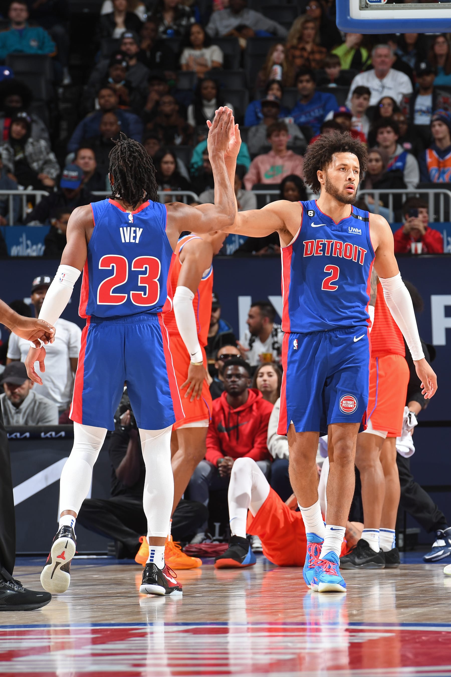 DETROIT, MI - NOVEMBER 7: Jaden Ivey #23 and Cade Cunningham #2 of the Detroit Pistons high five against the Oklahoma City Thunder on November 7, 2022 at Little Caesars Arena in Detroit, Michigan. NOTE TO USER: User expressly acknowledges and agrees that, by downloading and/or using this photograph, User is consenting to the terms and conditions of the Getty Images License Agreement. Mandatory Copyright Notice: Copyright 2022 NBAE (Photo by Chris Schwegler/NBAE via Getty Images)