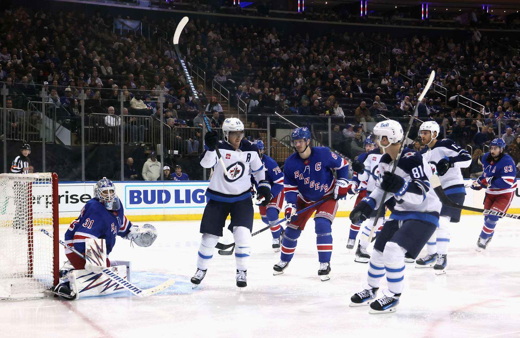 NEW YORK, NEW YORK - NOVEMBER 12: Mark Scheifele #55 of the Winnipeg Jets scores a third period goal against Igor Shesterkin #31 of the New York Rangers at Madison Square Garden on November 12, 2024 in New York City. The Jets defeated the Rangers 6-3.  (Photo by Bruce Bennett/Getty Images)