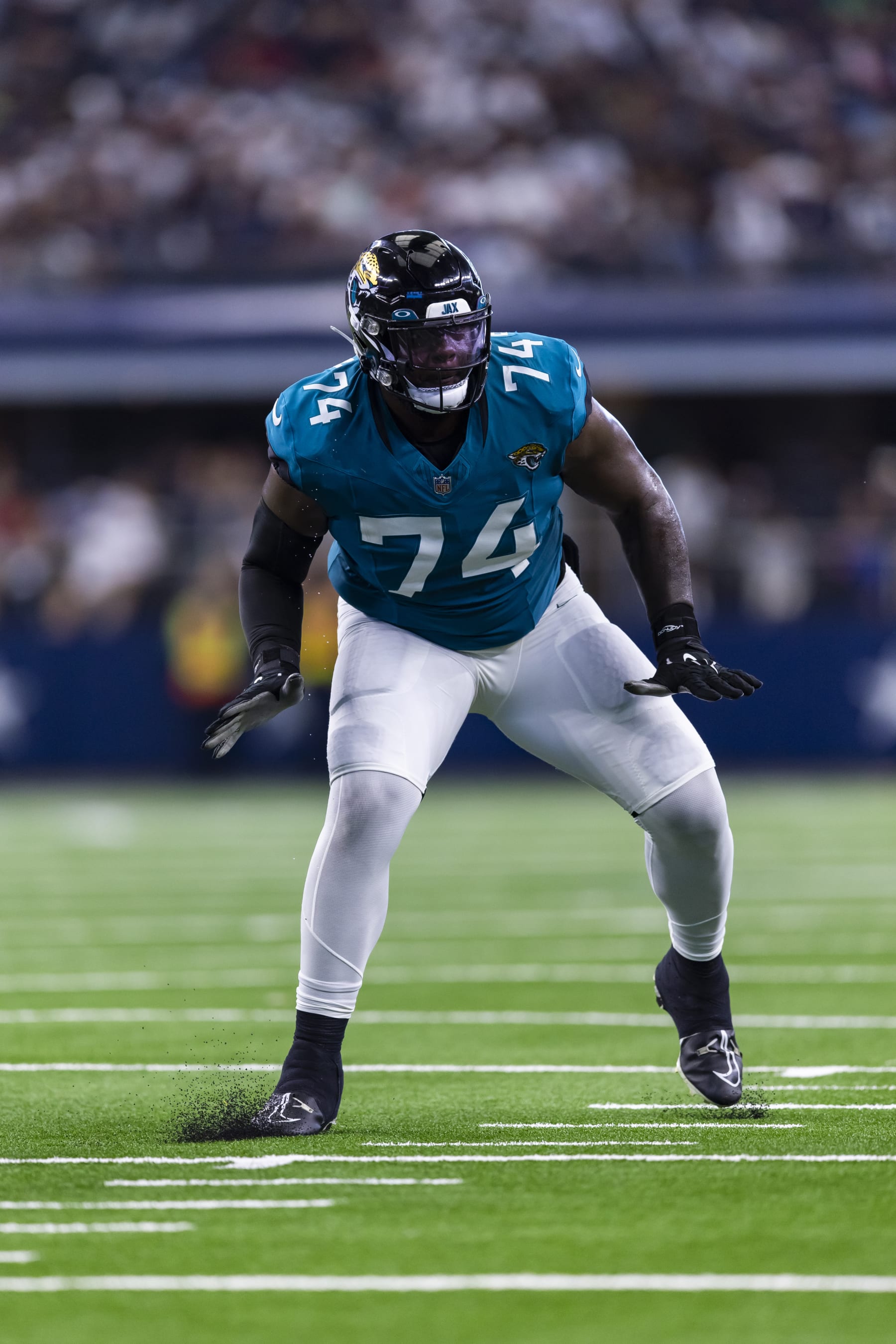 Jacksonville Jaguars offensive tackle Cam Robinson (74) is seen during the second half of an NFL football game against the Dallas Cowboys, Saturday, Aug. 12, 2023, in Arlington, Texas. Jacksonville won 28-23. (AP Photo/Brandon Wade)