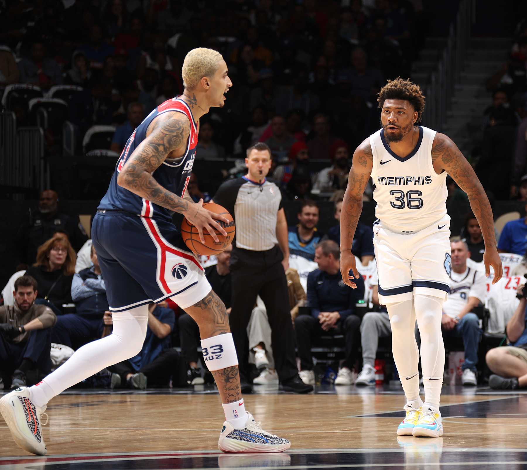 WASHINGTON, DC -  OCTOBER 28: Marcus Smart #36 of the Memphis Grizzlies plays defense during the game against the Washington Wizards on October 28, 2023 at Capital One Arena in Washington, DC. NOTE TO USER: User expressly acknowledges and agrees that, by downloading and or using this Photograph, user is consenting to the terms and conditions of the Getty Images License Agreement. Mandatory Copyright Notice: Copyright 2023 NBAE (Photo by Stephen Gosling/NBAE via Getty Images)